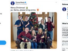 ‘Santa, bring ammo’: GOP congressman and family pose with guns for Christmas photo days after school shooting