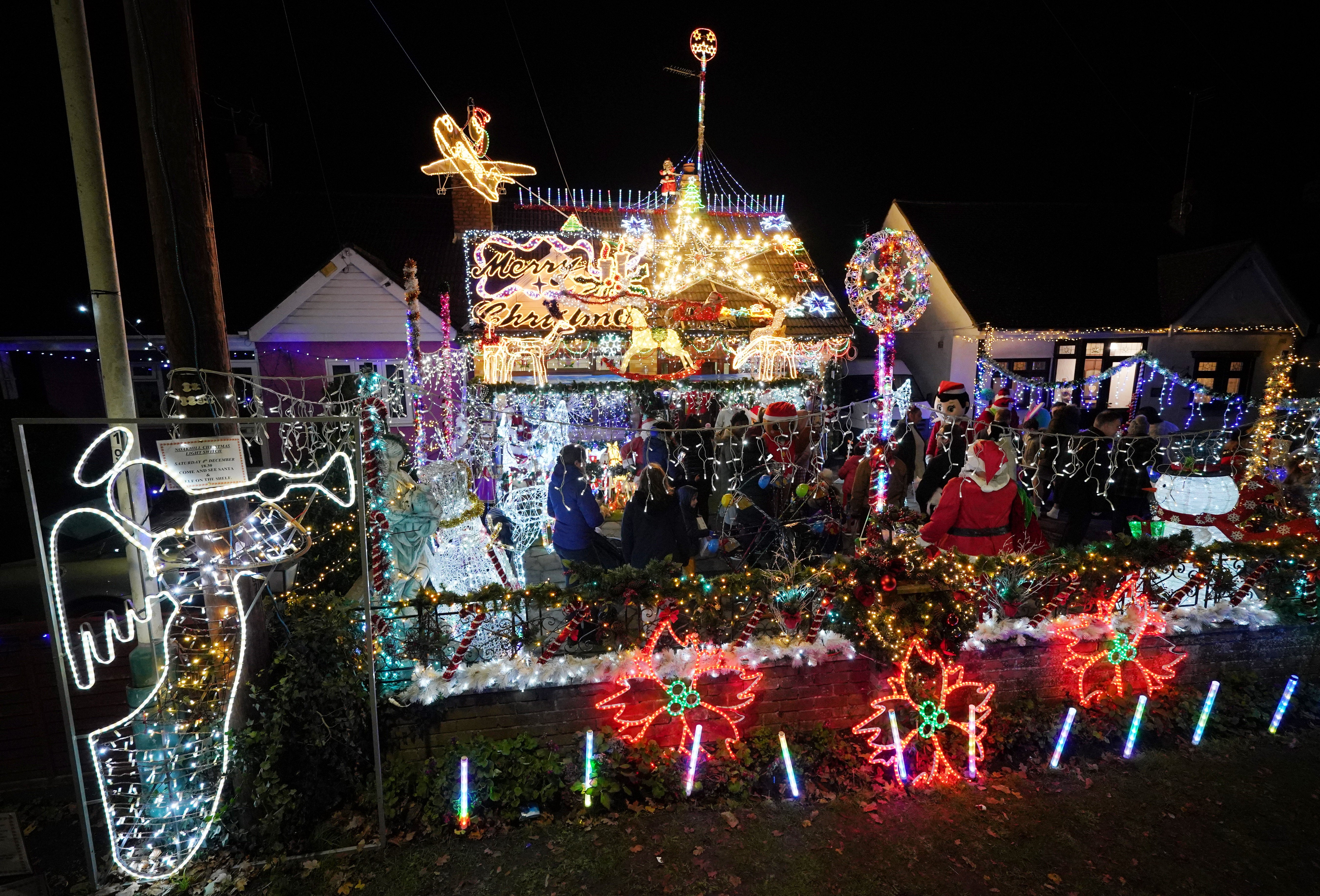 Peter Elliott and Lesley Haylett’s display of their Christmas lights (Jonathan Brady/PA)