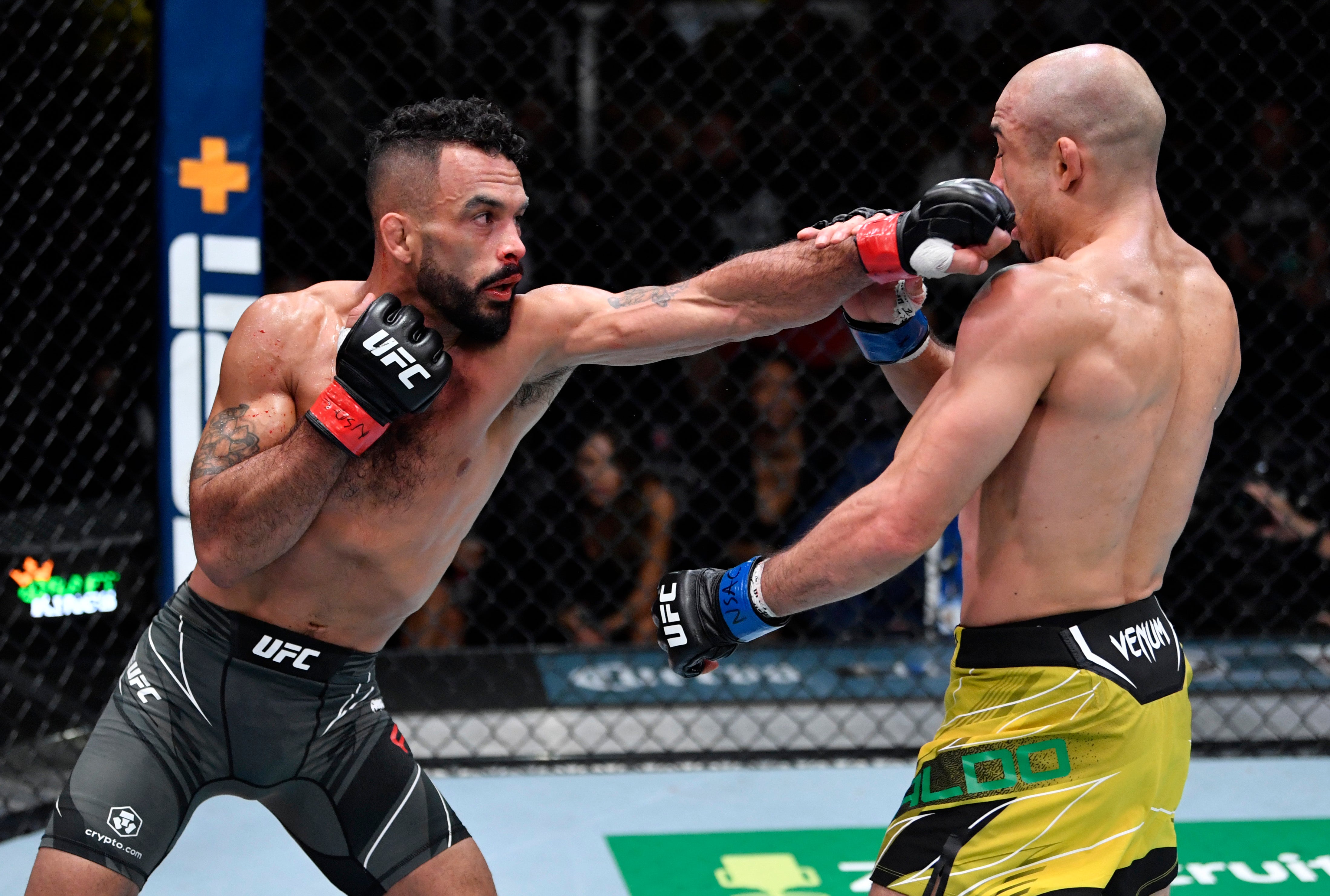 Rob Font flicks out a jab against Jose Aldo