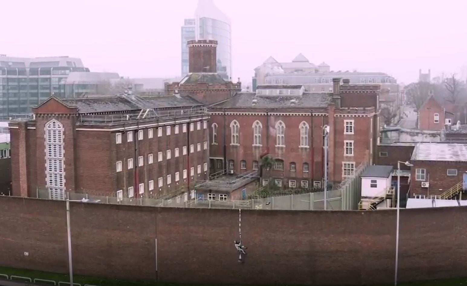 Banksy painted an artwork on the side of the former prison, which housed Oscar Wilde (Banksy/PA)