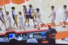 High school basketball player charged over handshake sucker punch caught on video
