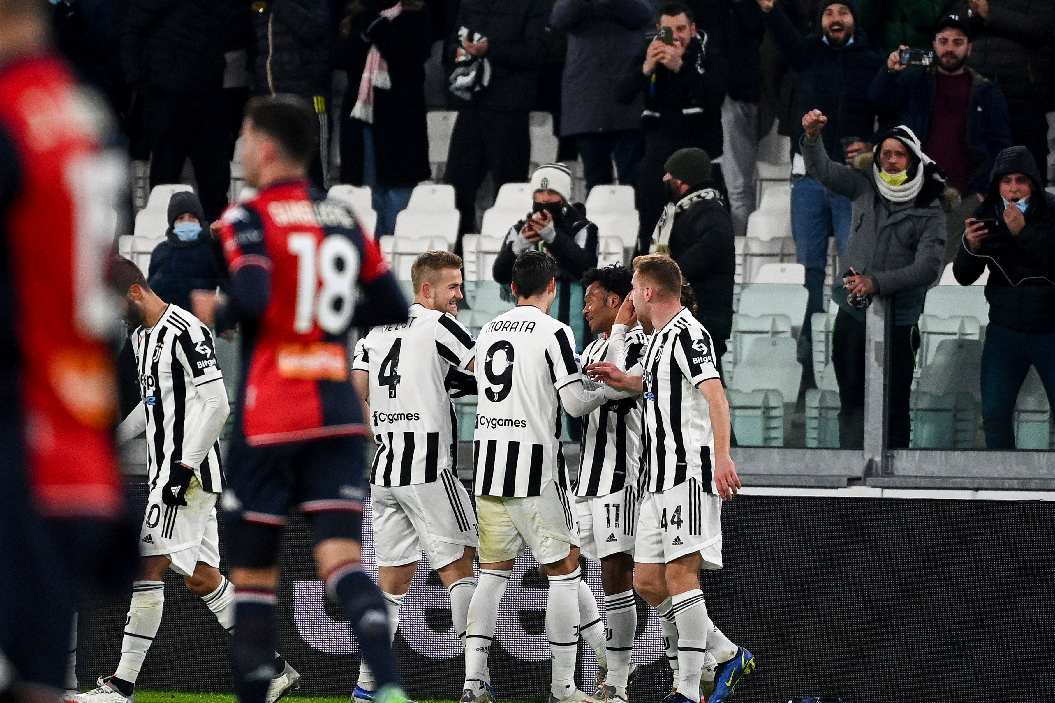 Juan Cuadrado is congratulated after scoring directly from a corner for Juventus (Marco Alpozzi/AP)