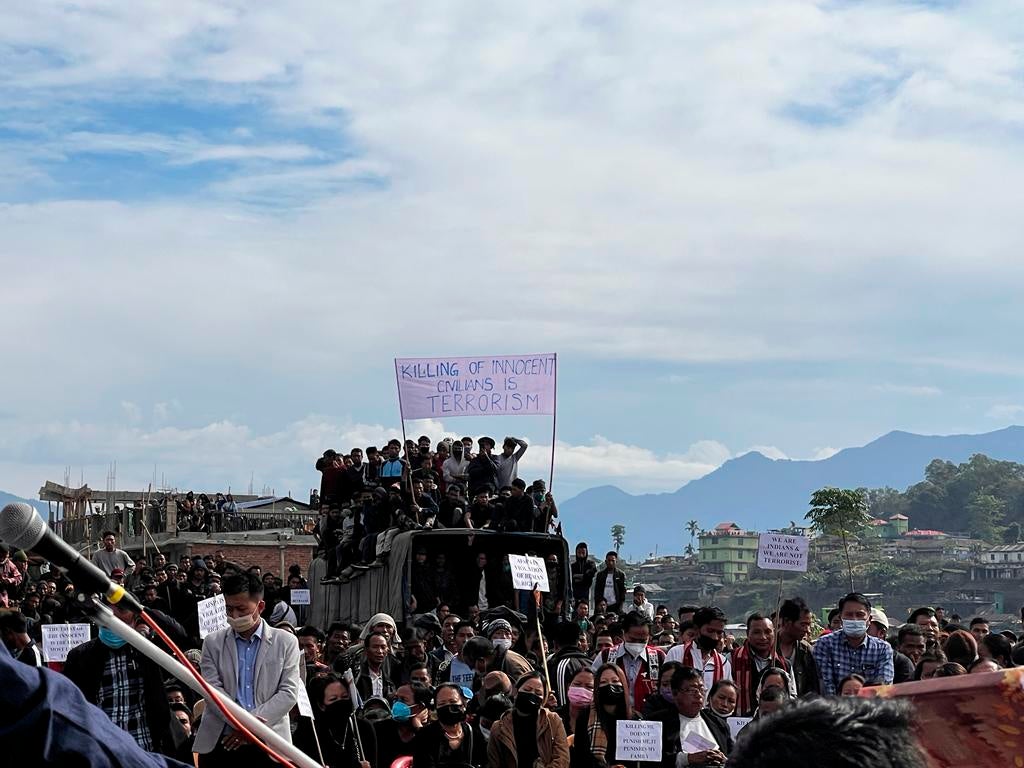 People attend the funeral of civilians killed by Indian army soldiers in Nagaland