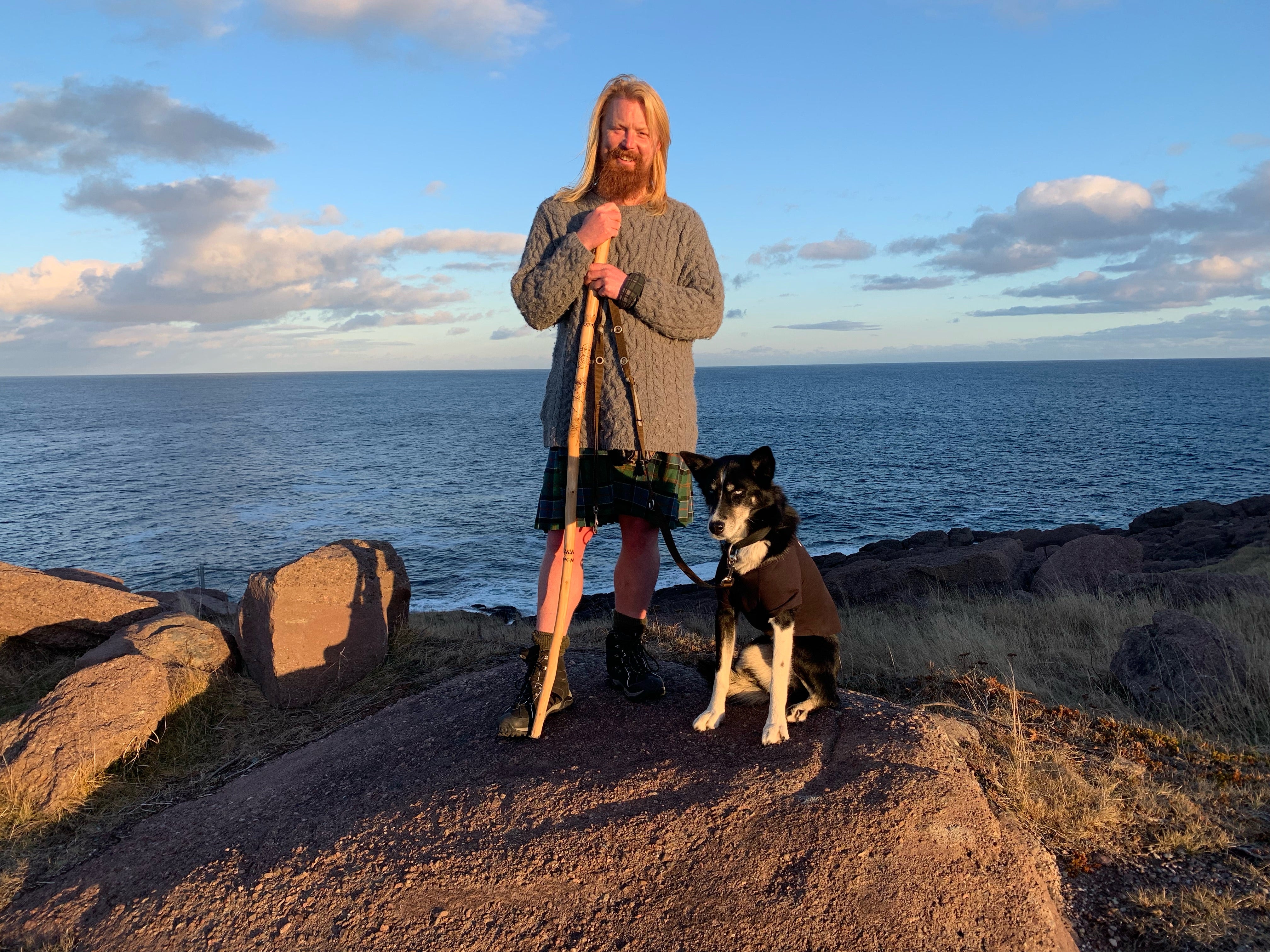 Michael Yellowlees with his Husky at Spear Point on Canada’s Atlantic coast.(Michael Yellowlees/PA)