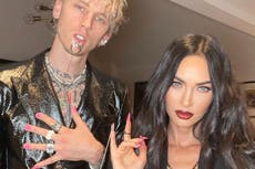 Machine Gun Kelly and Megan Fox link pinky fingers with chain for nail polish launch party