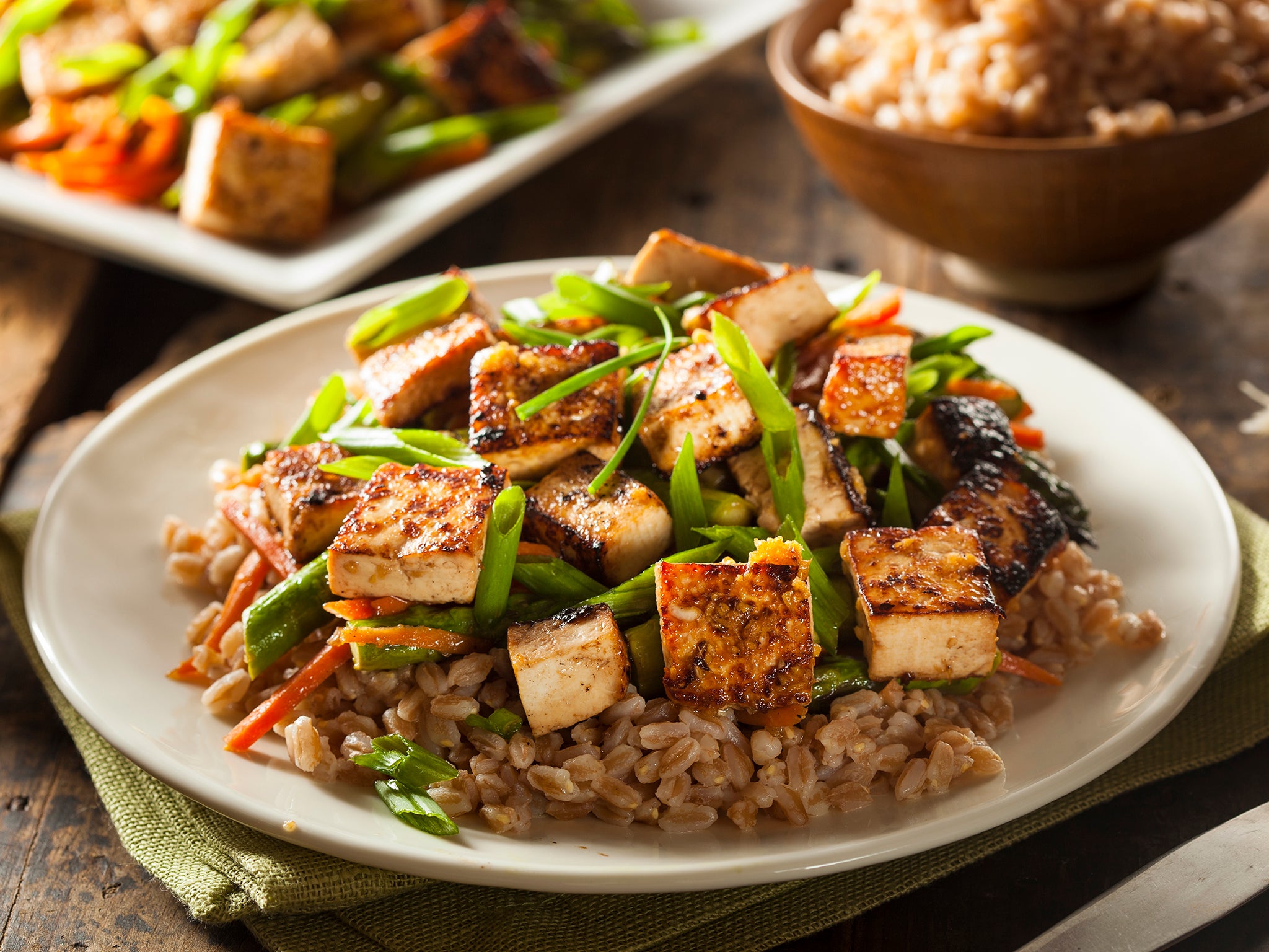 The dark, star-anise-spiced caramel sauce is absorbed by the tofu and rice