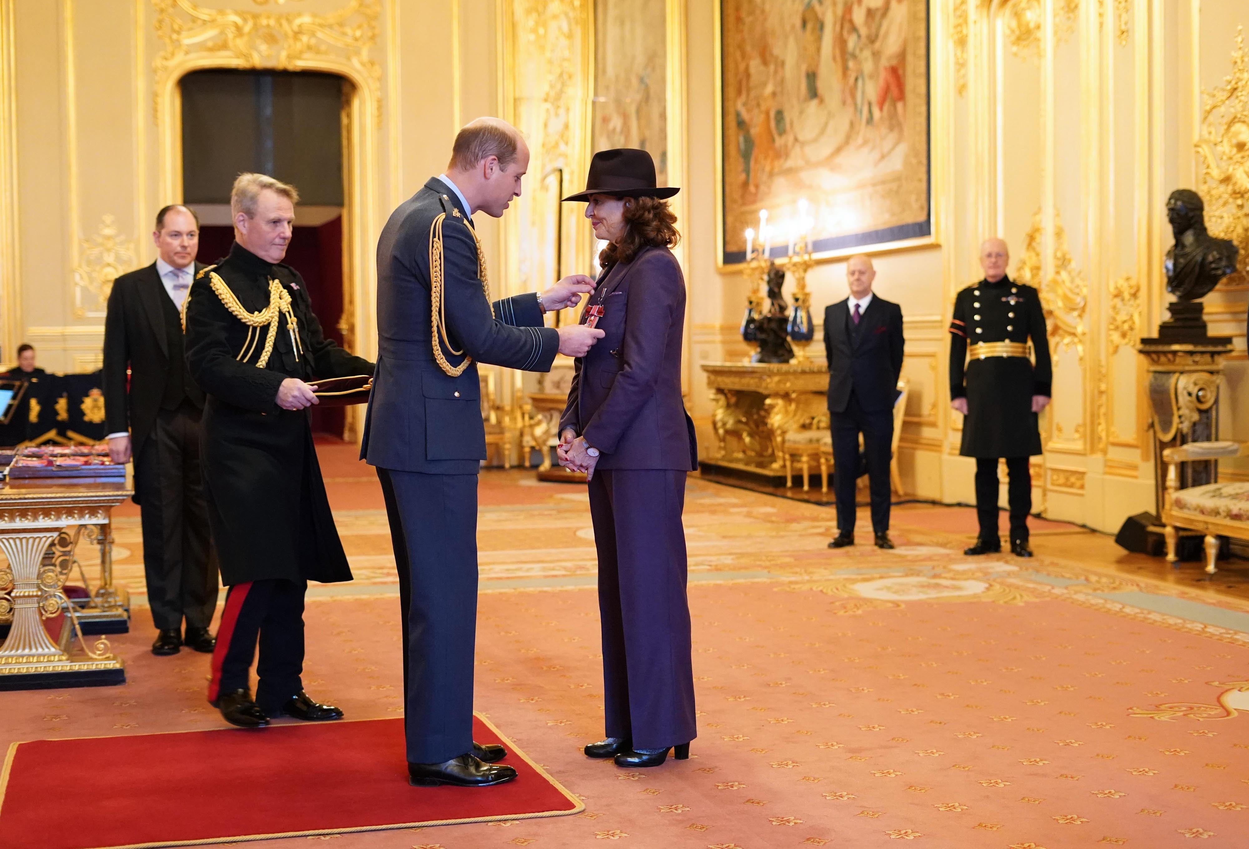 Diana Johnson is made a Dame Commander of the British Empire by the Duke of Cambridge at Windsor Castle (Dominic Lipinski/PA)