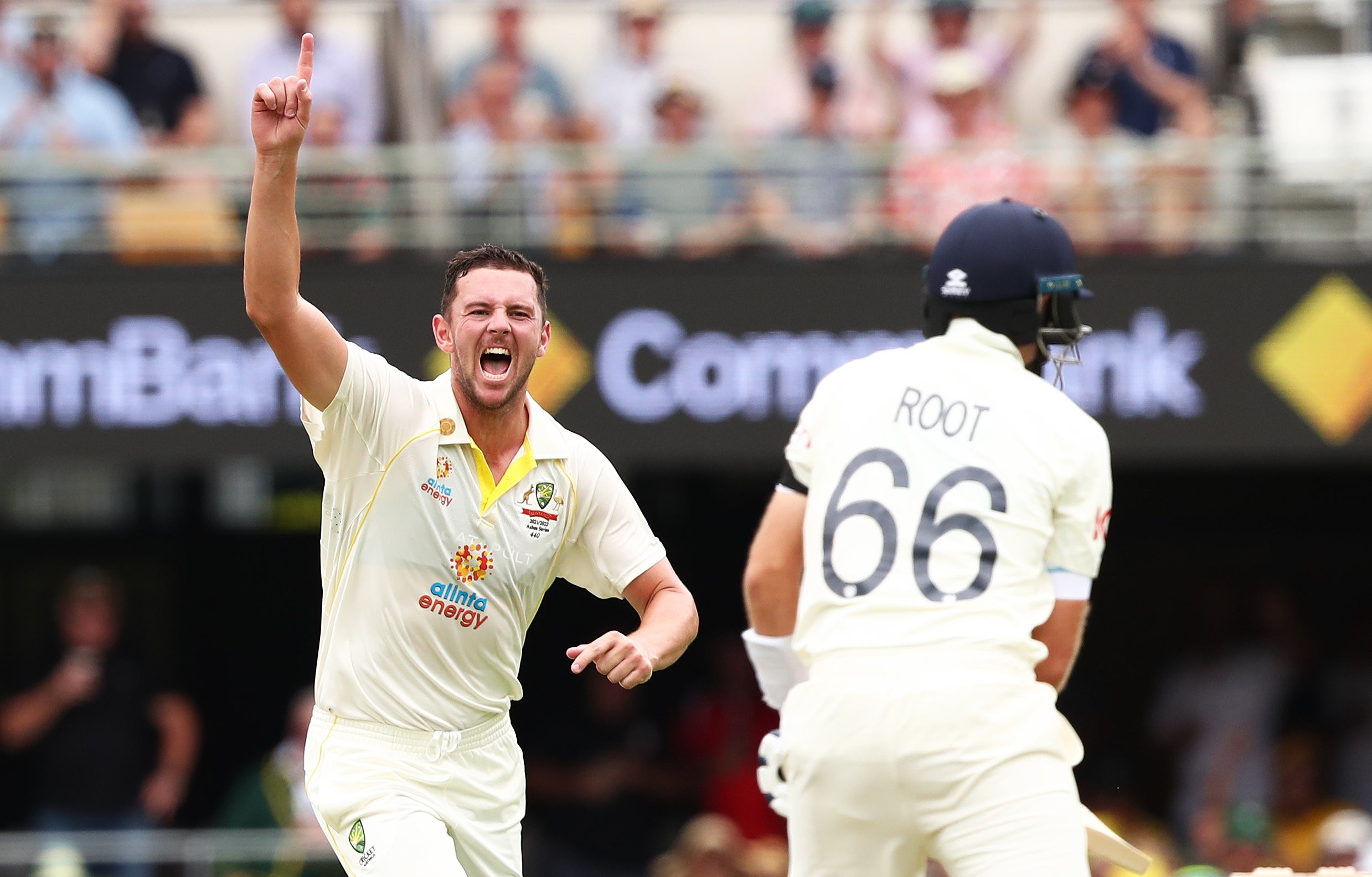 Australia’s Josh Hazlewood celebrates the wicket of England’s Joe Root during day one of the first Ashes test at The Gabba, Brisbane (Jason O’Brien/PA)