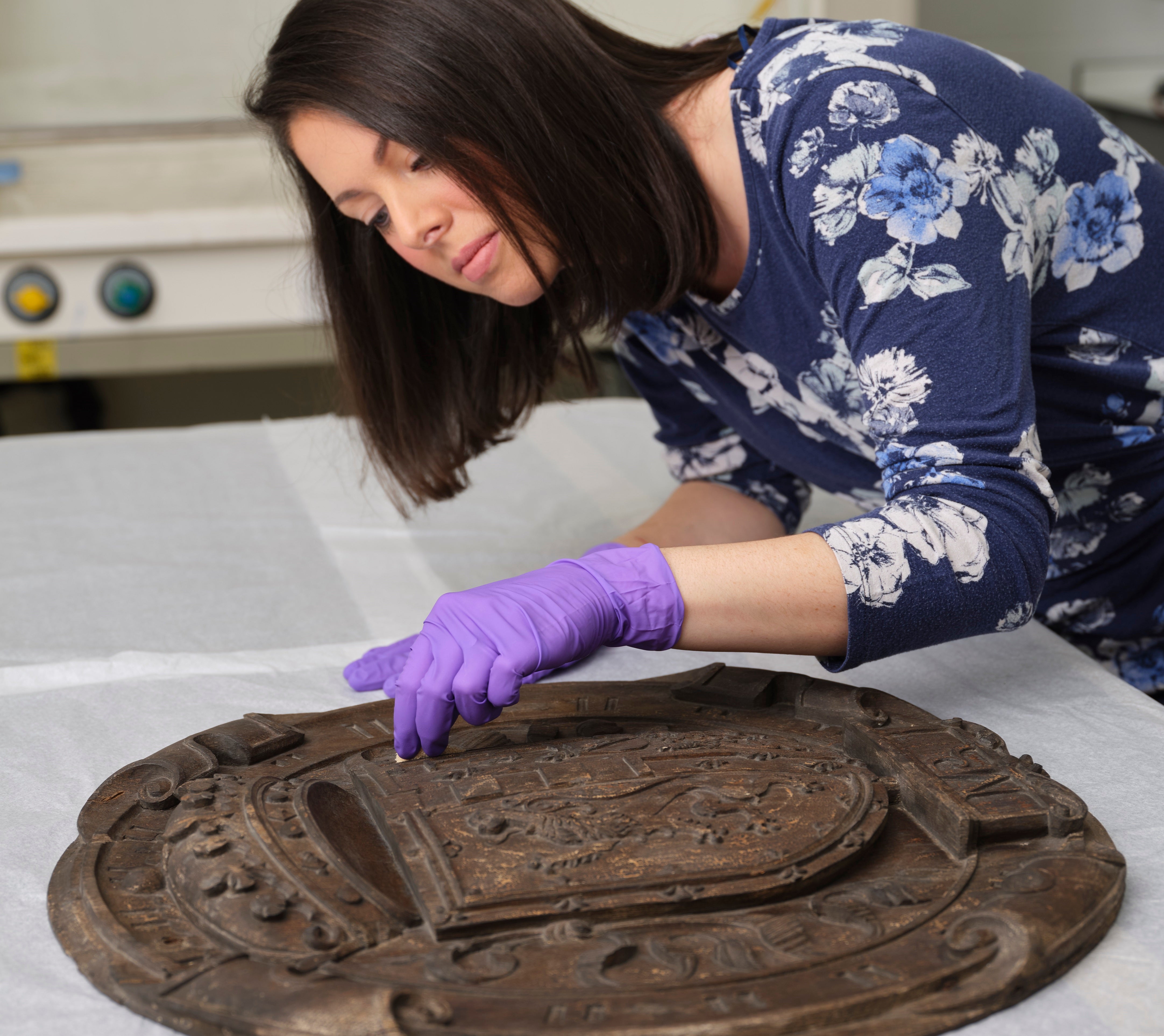 Conservators are working on the panels (National Museums Scotland/PA)