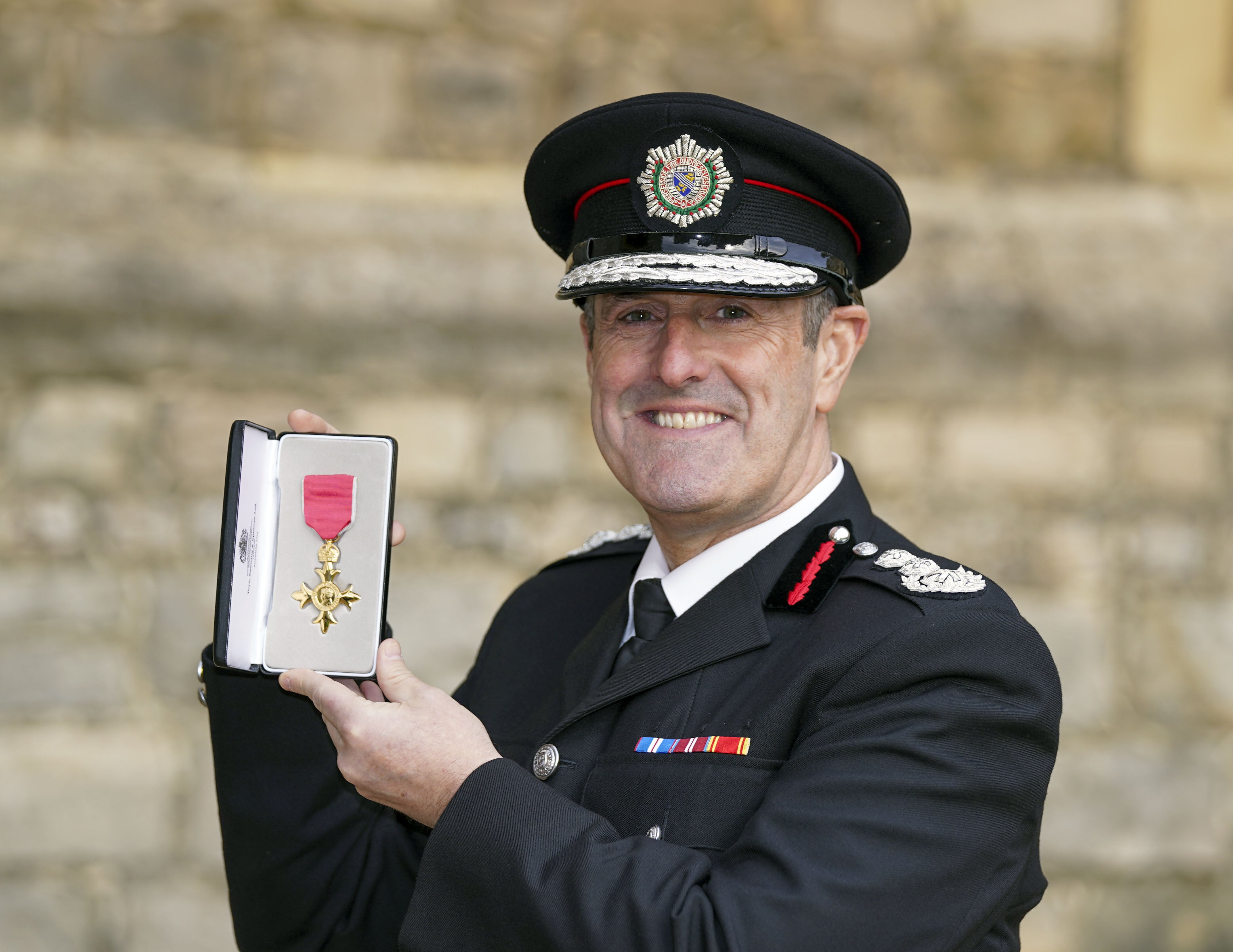 Merseyside Fire & Rescue Service chief Phil Garrigan was made a OBE by the Prince of Wales at an investiture ceremony at Windsor Castle (Steve Parsons/PA)