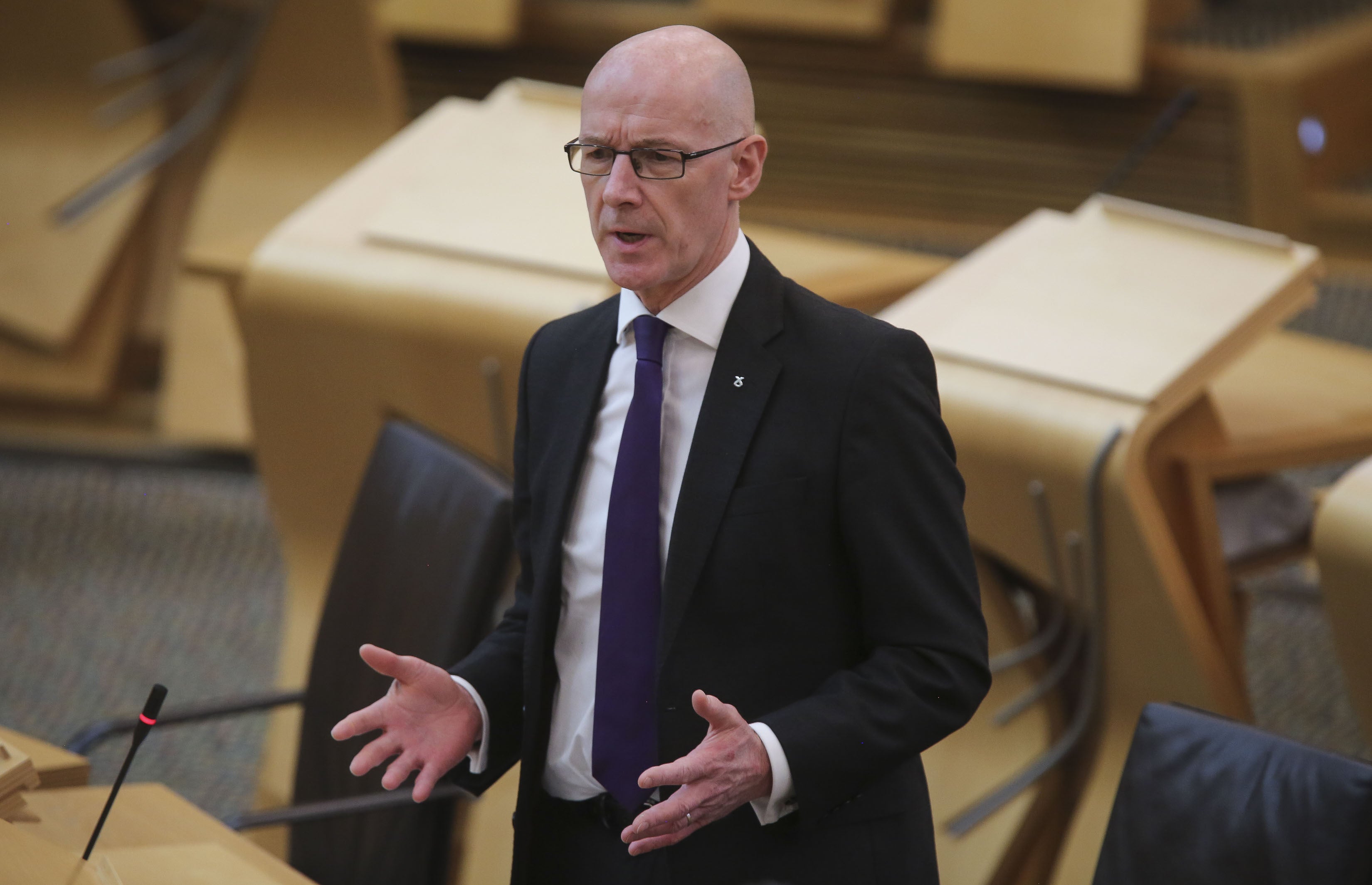 John Swinney updated MSPs on Wednesday (Fraser Bremner/PA)