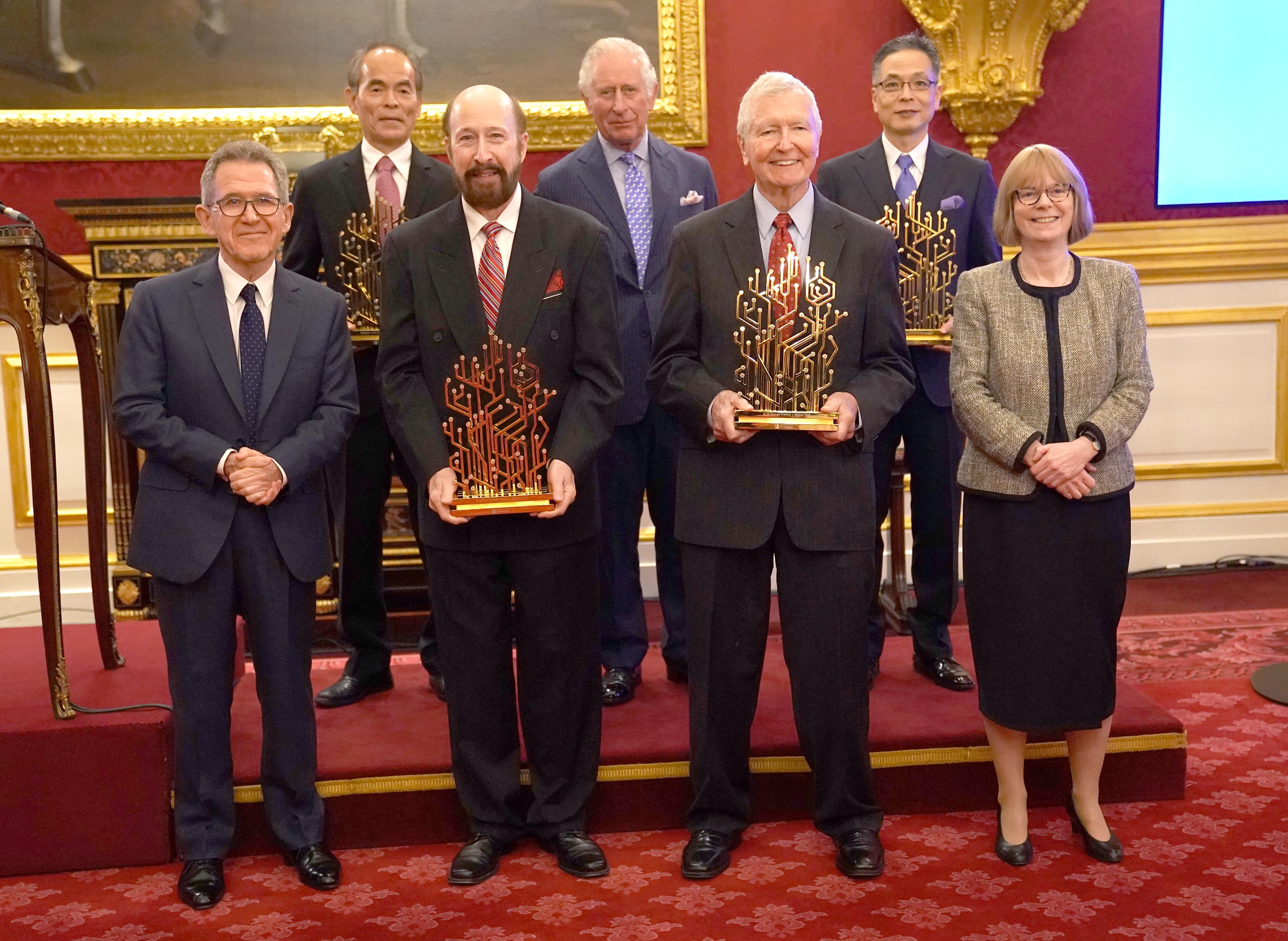 The Prince of Wales poses with trophy winners after presenting the Queen Elizabeth Prize for Engineering (Kirsty O’Connor/PA)