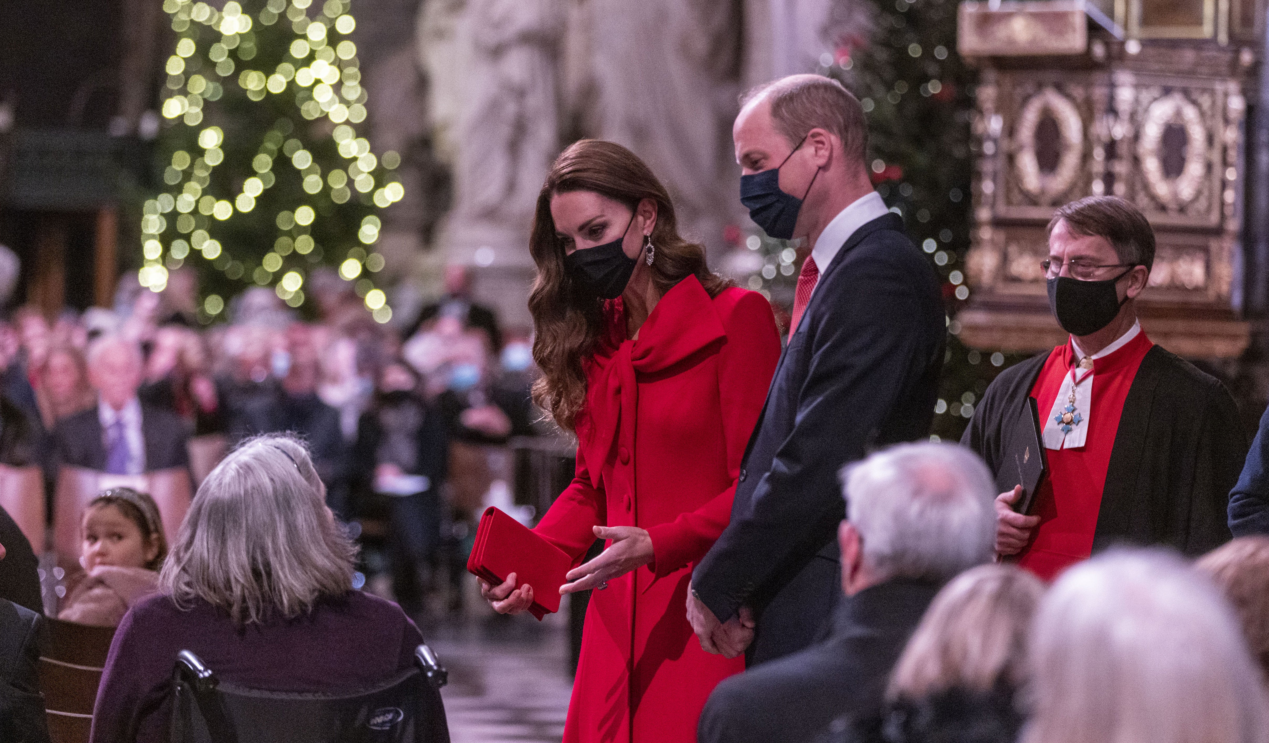 The Duke and Duchess of Cambridge talk to the congregation ahead of the carol service (Heathcliff O’Malley/PA)