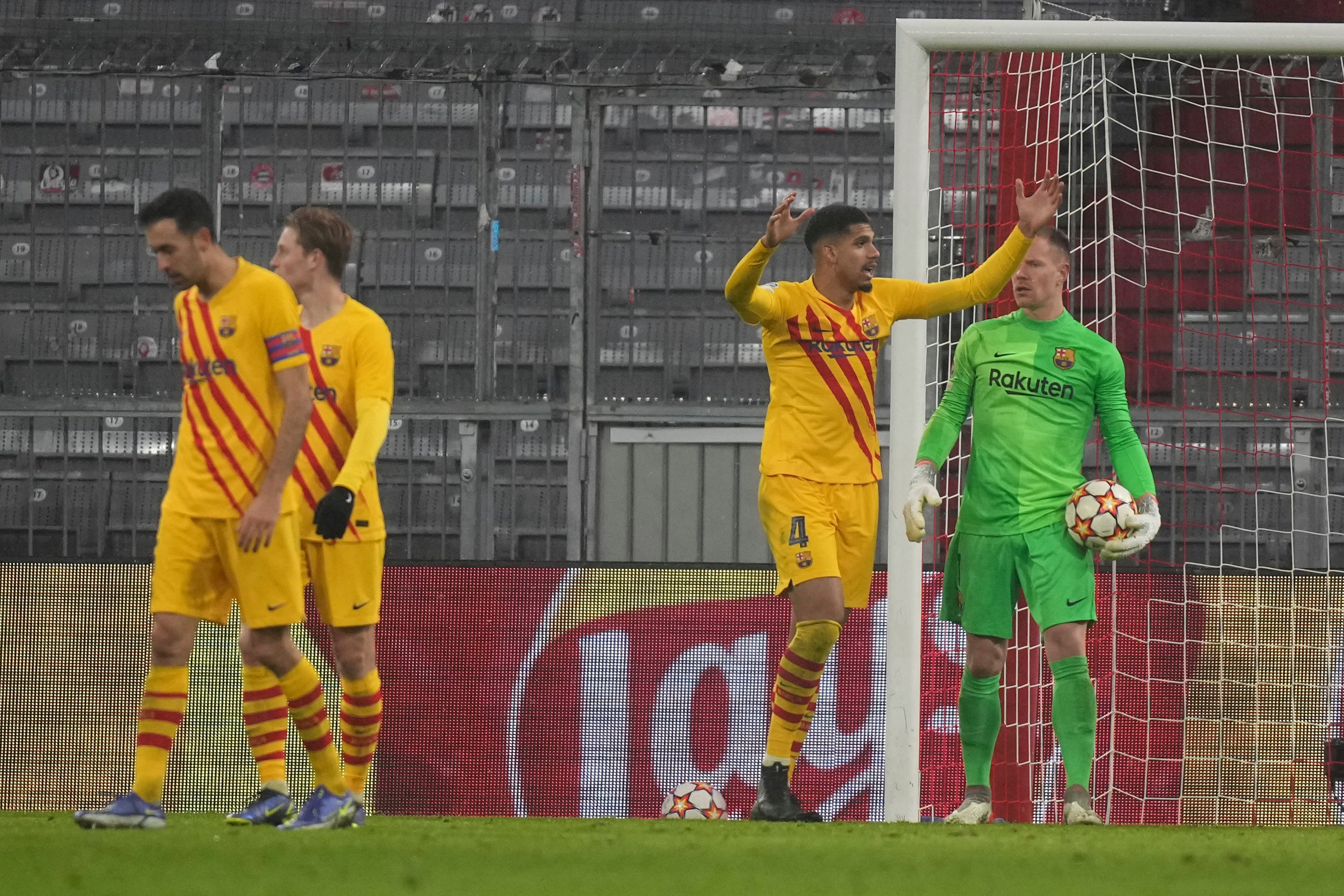 Barcelona heads are bowed after a 3-0 defeat to Bayern Munich confirmed their Champions League exit (Matthias Schrader/AP)