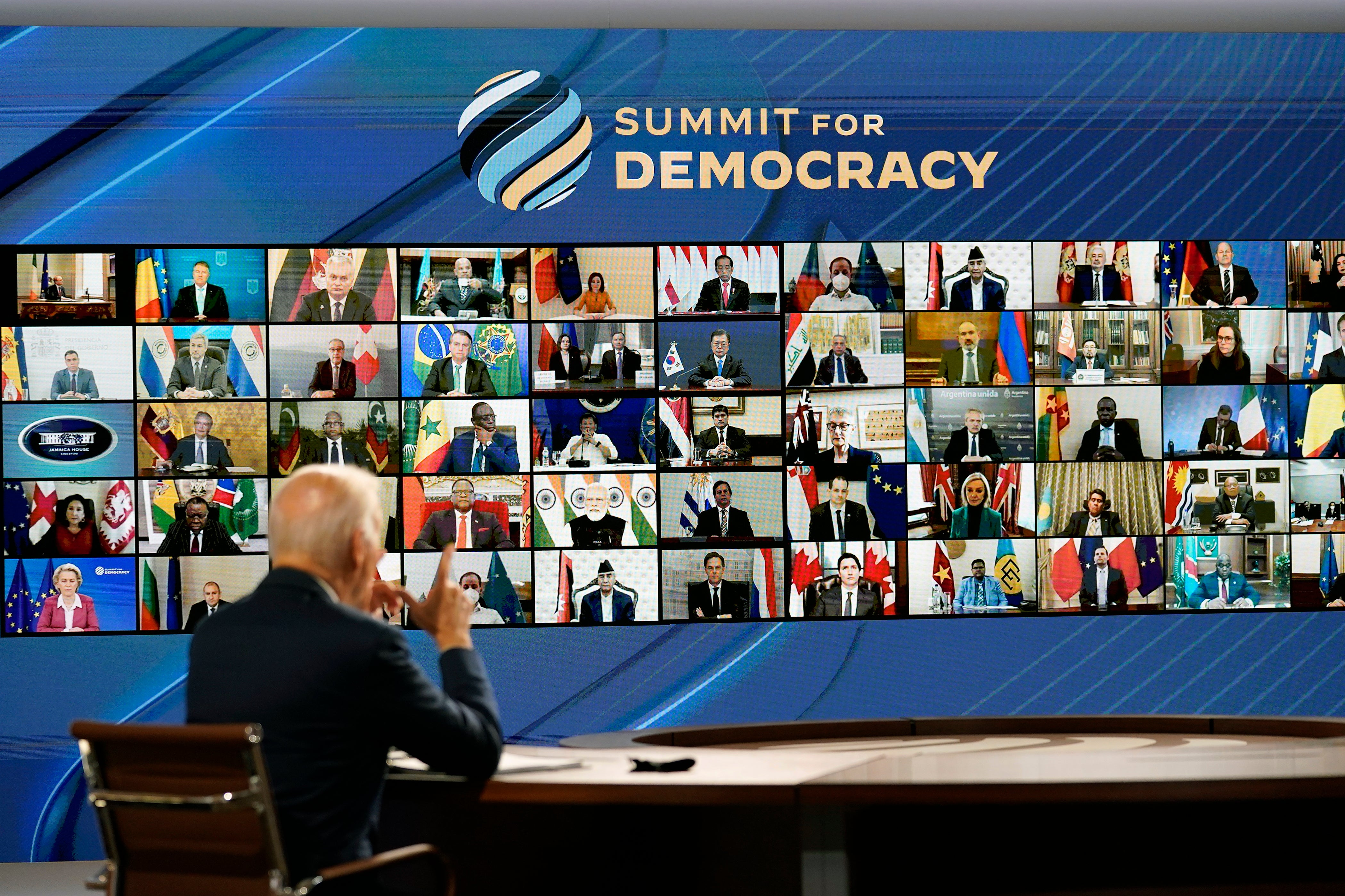 President Joe Biden speaks from the South Court Auditorium on the White House complex in Washington, Thursday, Dec. 9, 2021, for the opening of the Democracy Summit.The two-day virtual summit is billed as an opportunity for leaders and civil society experts from some 110 countries to collaborate on fighting corruption and promoting respect for human rights. (AP Photo/Susan Walsh)