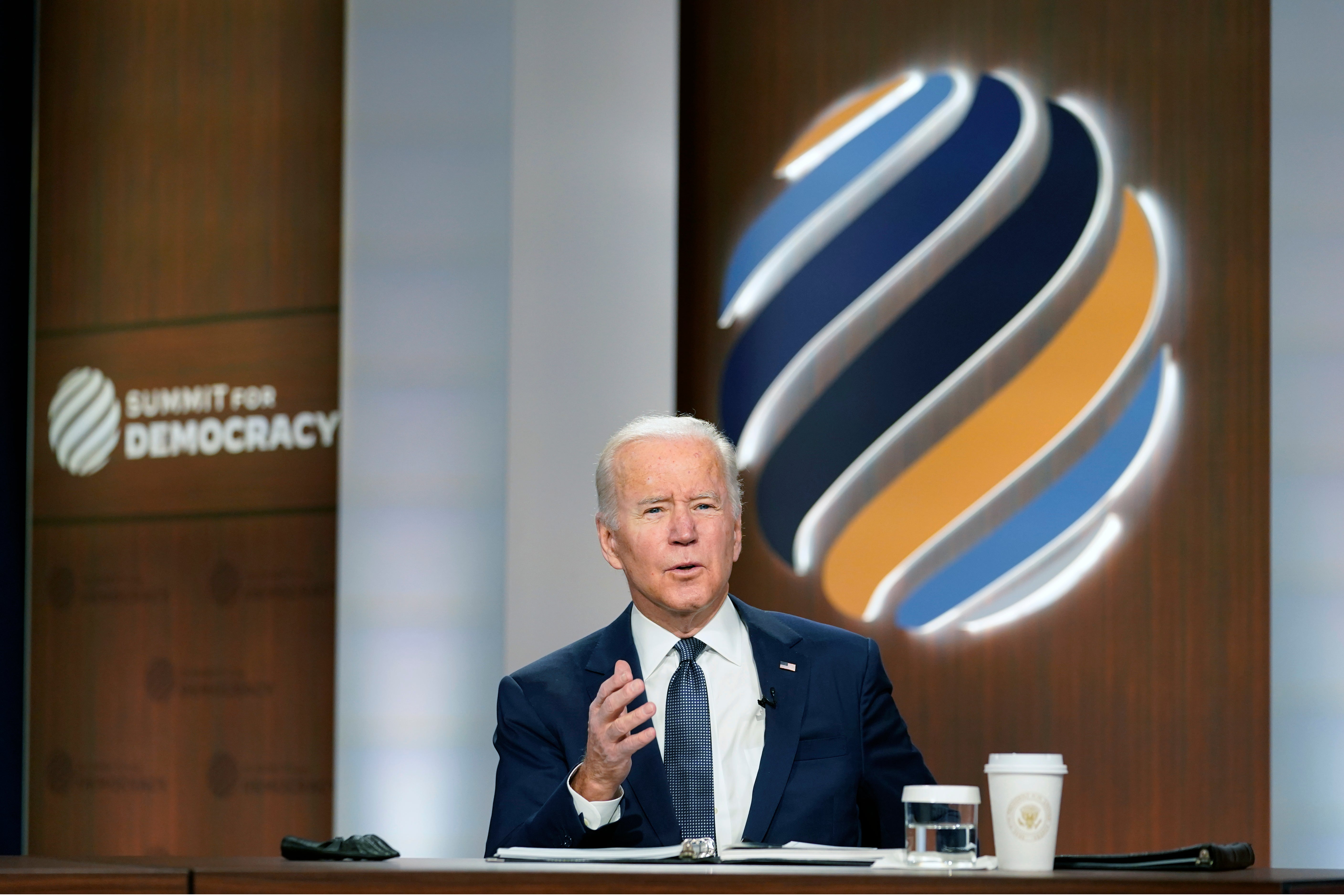 President Joe Biden speaks from the South Court Auditorium on the White House complex in Washington, Thursday, Dec. 9, 2021, for the opening of the Democracy Summit. The two-day virtual summit is billed as an opportunity for leaders and civil society experts from some 110 countries to collaborate on fighting corruption and promoting respect for human rights. (AP Photo/Susan Walsh)