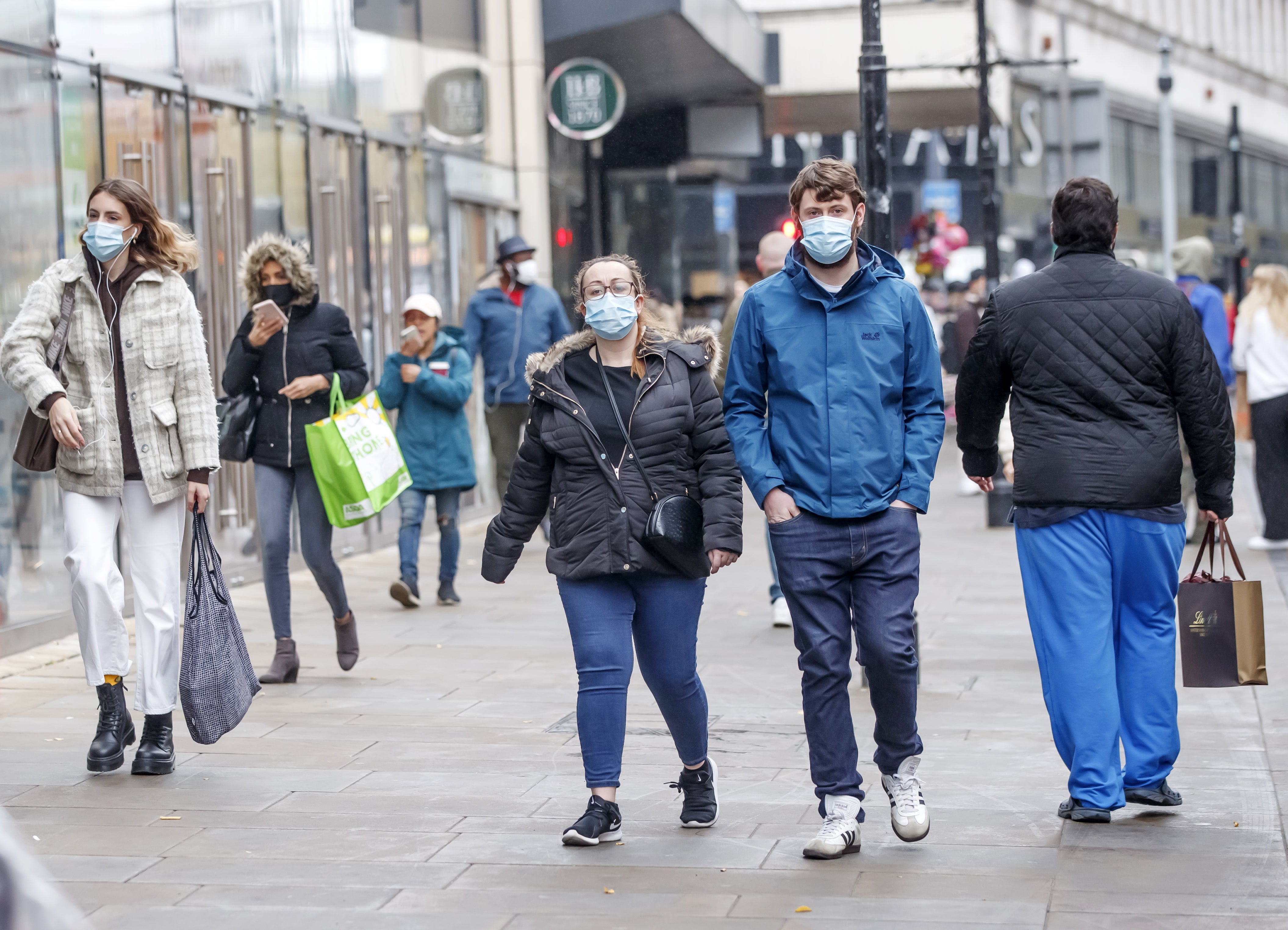 Masks are now mandatory in most public indoor settings in England (Danny Lawson/PA)