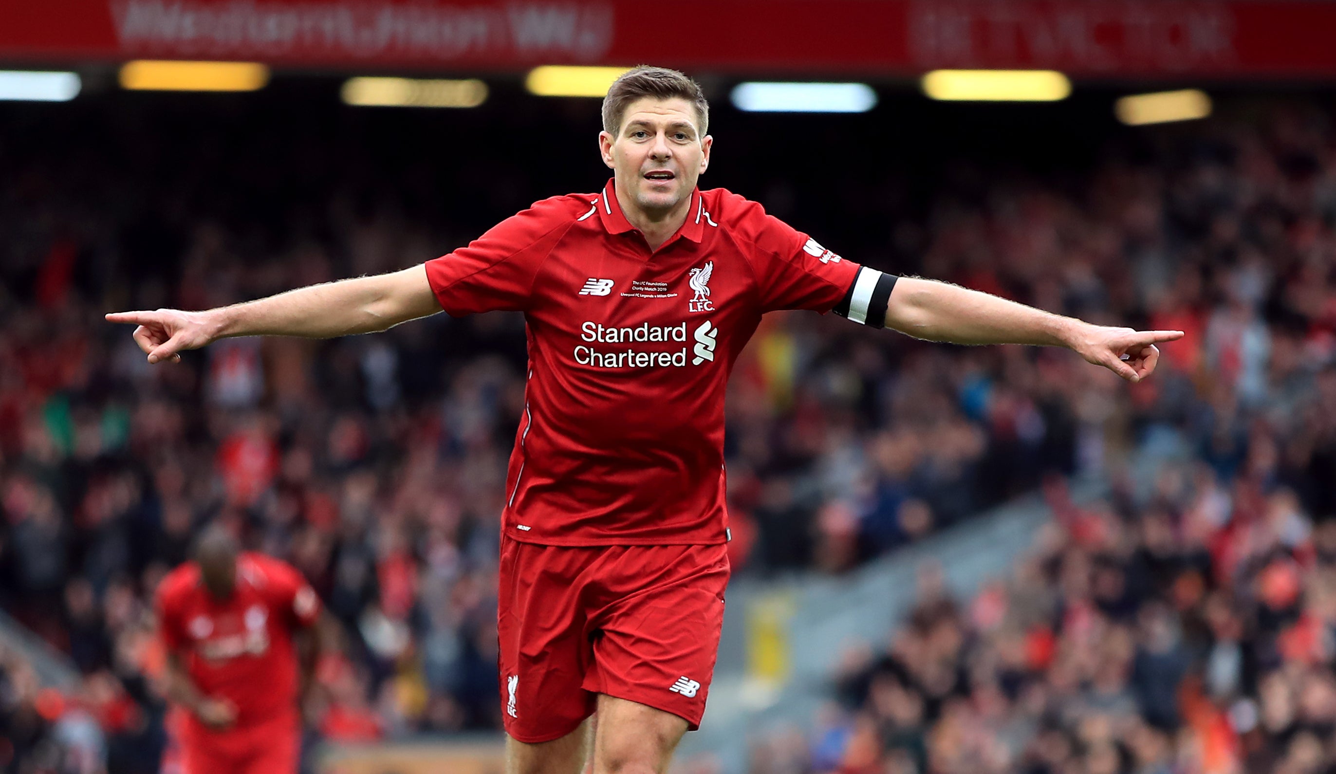 Steven Gerrard celebrates scoring for Liverpool during his 17-year senior playing career at Anfield (Peter Byrne/PA)