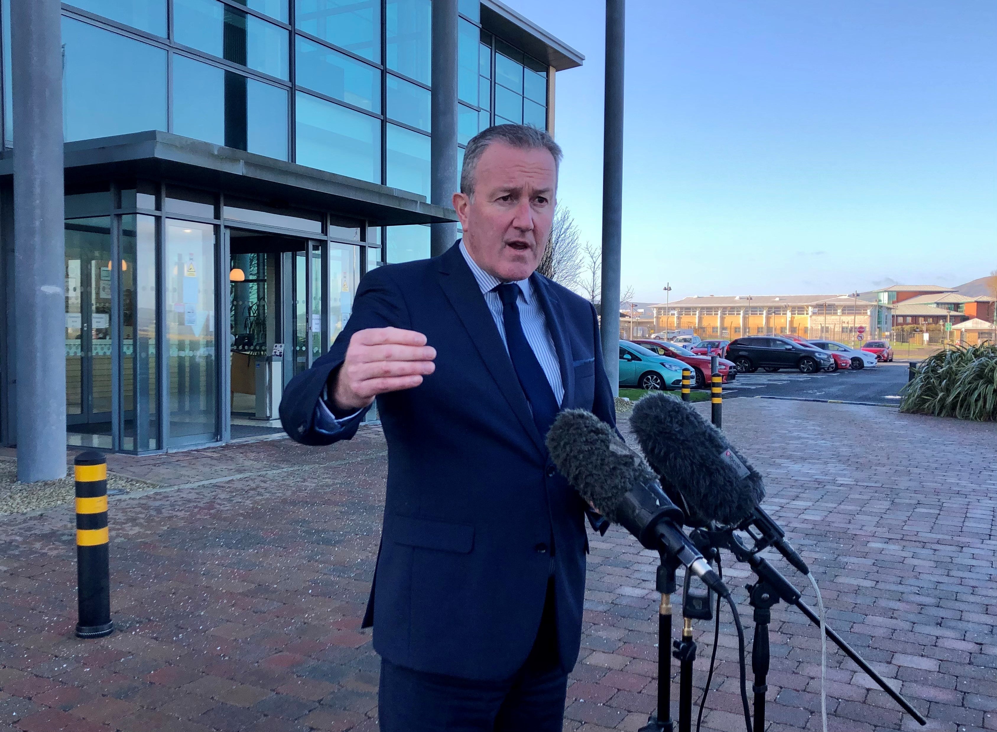 Conor Murphy speaks to the media outside the Department of Finance in Belfast (David Young/PA)