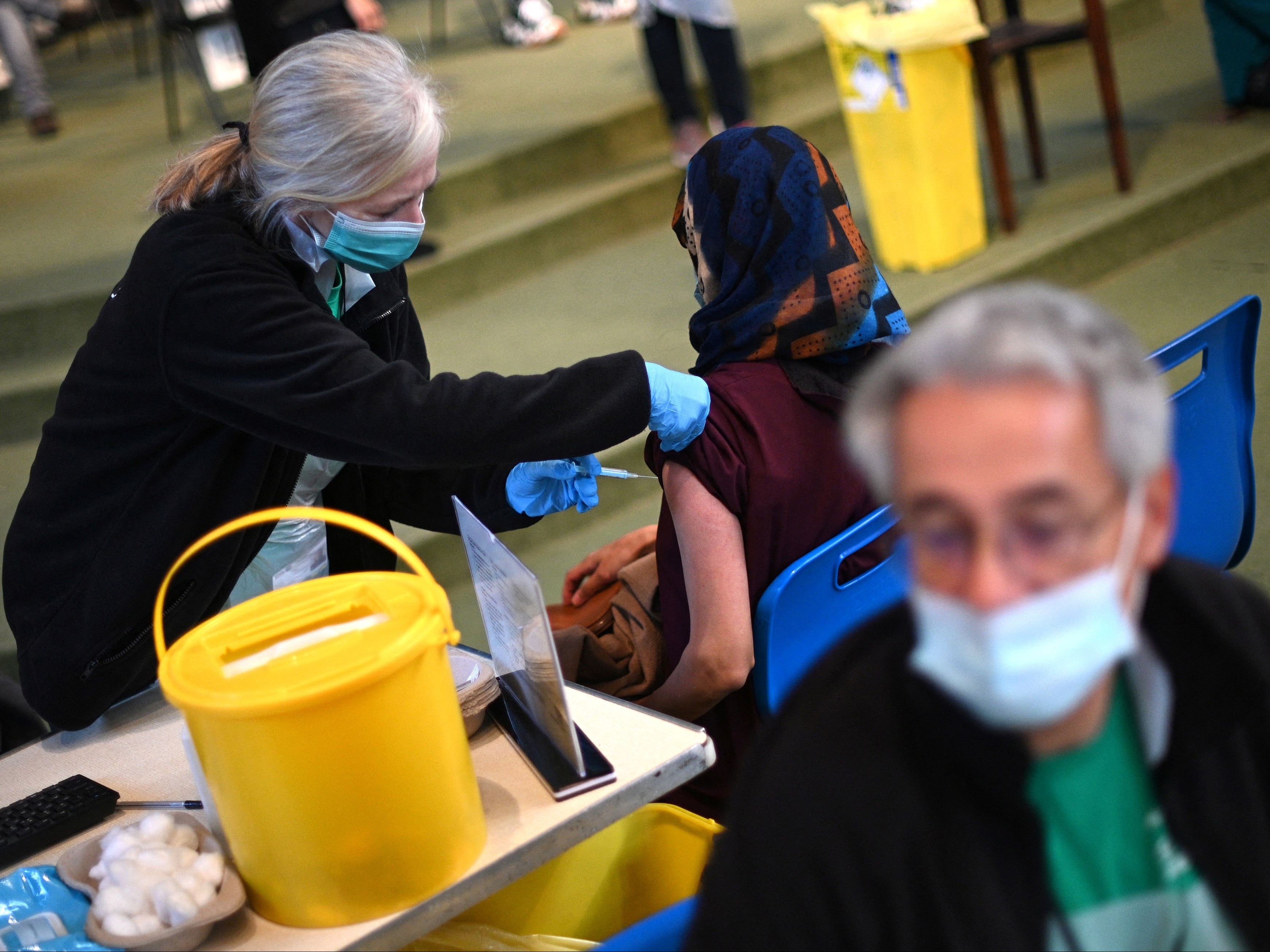 Omicron: Two Covid jabs provide weak protection against new variant, but boosters up to 75% effective