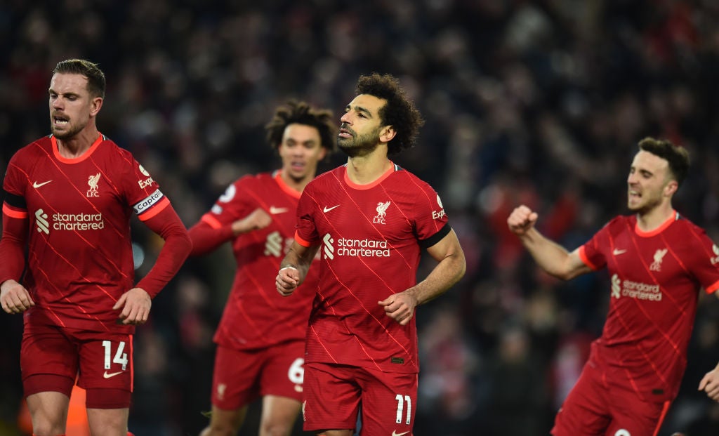 Mohamed Salah (centre) celebrates his goal