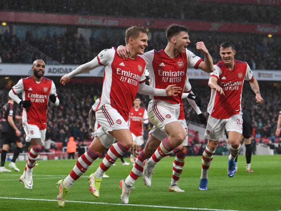 Martin Odegaard (second left) celebrates Arsenal’s second goal against Southampton