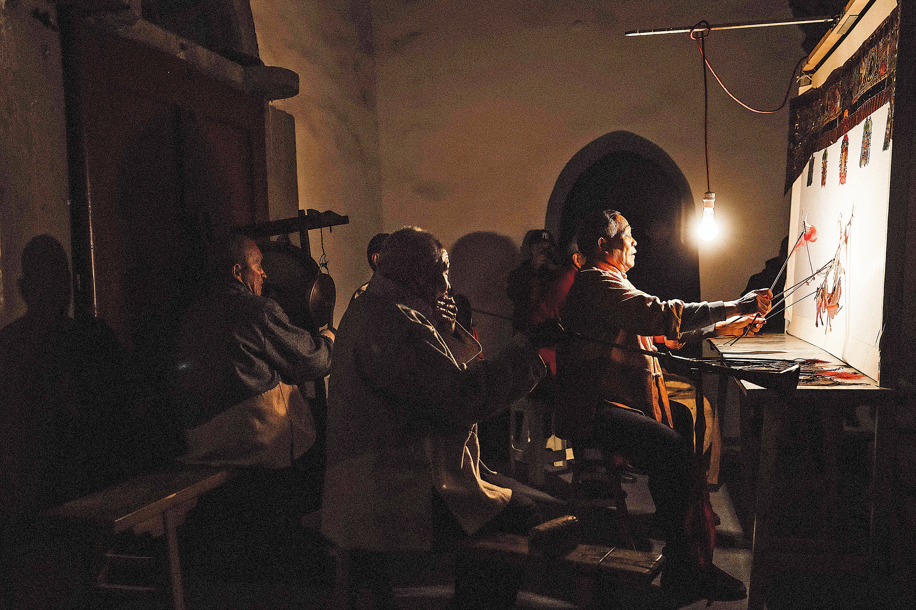 Elderly performers have carried on the tradition of shadow play, which incorporates puppet-making with folk music, opera-singing and storytelling