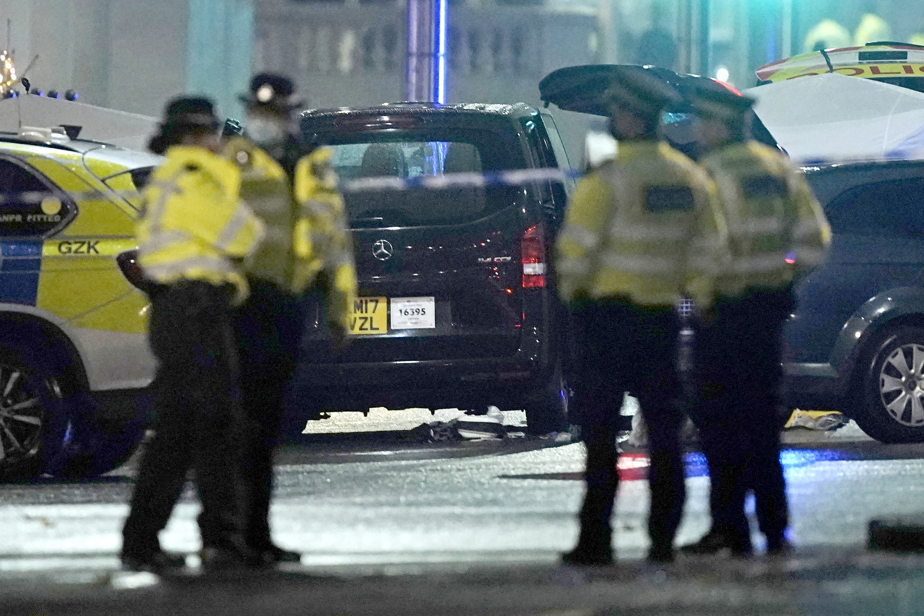 Police at the scene near Kensington High Street in London, where a man died after suffering gunshot wounds in an incident involving armed officers (Aaron Chown/PA)