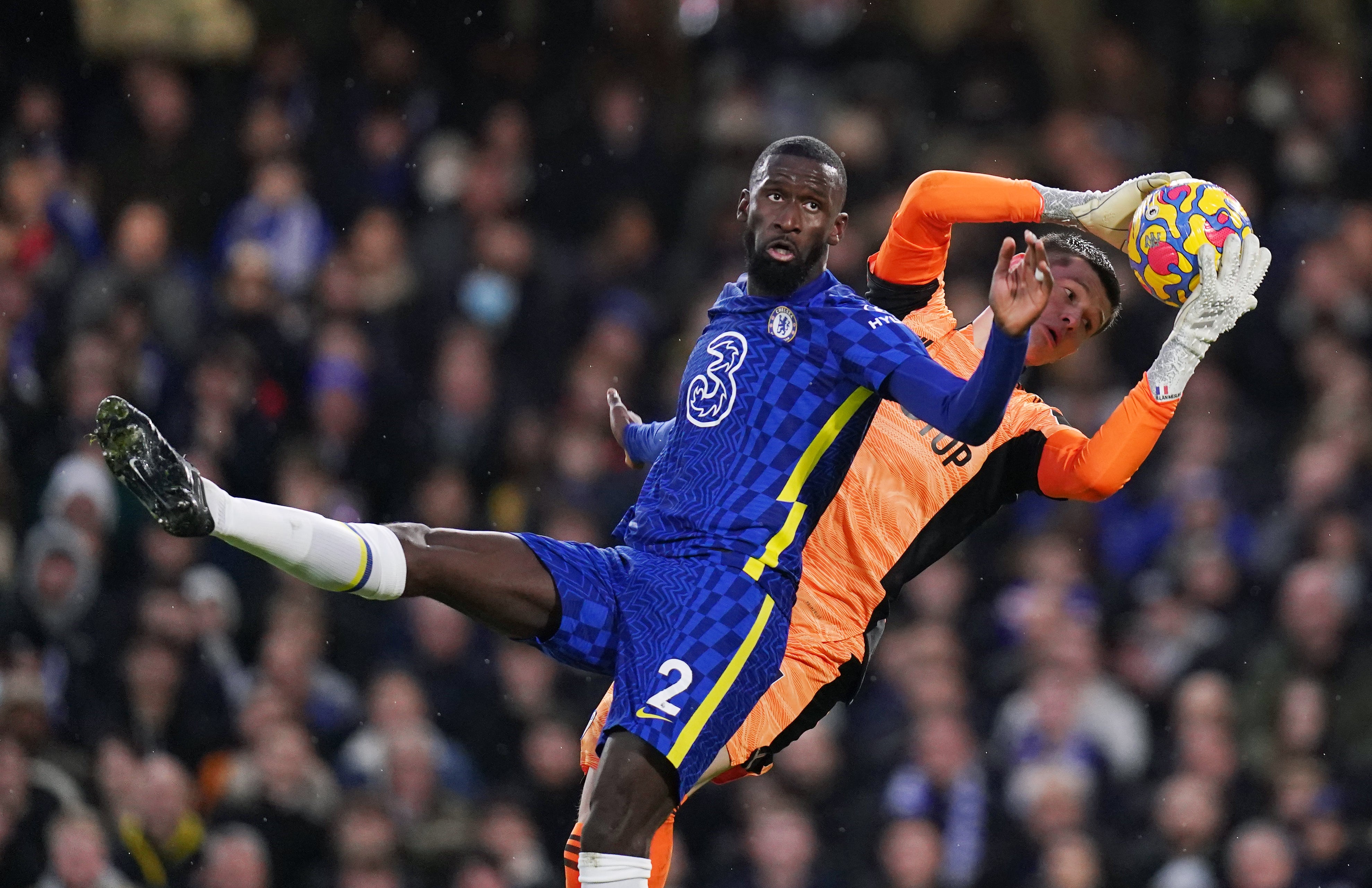 Chelsea’s Toni Rudiger and Leeds United goalkeeper Illan Meslier, right, battle for the ball at Stamford Bridge (Adam Davy/PA)