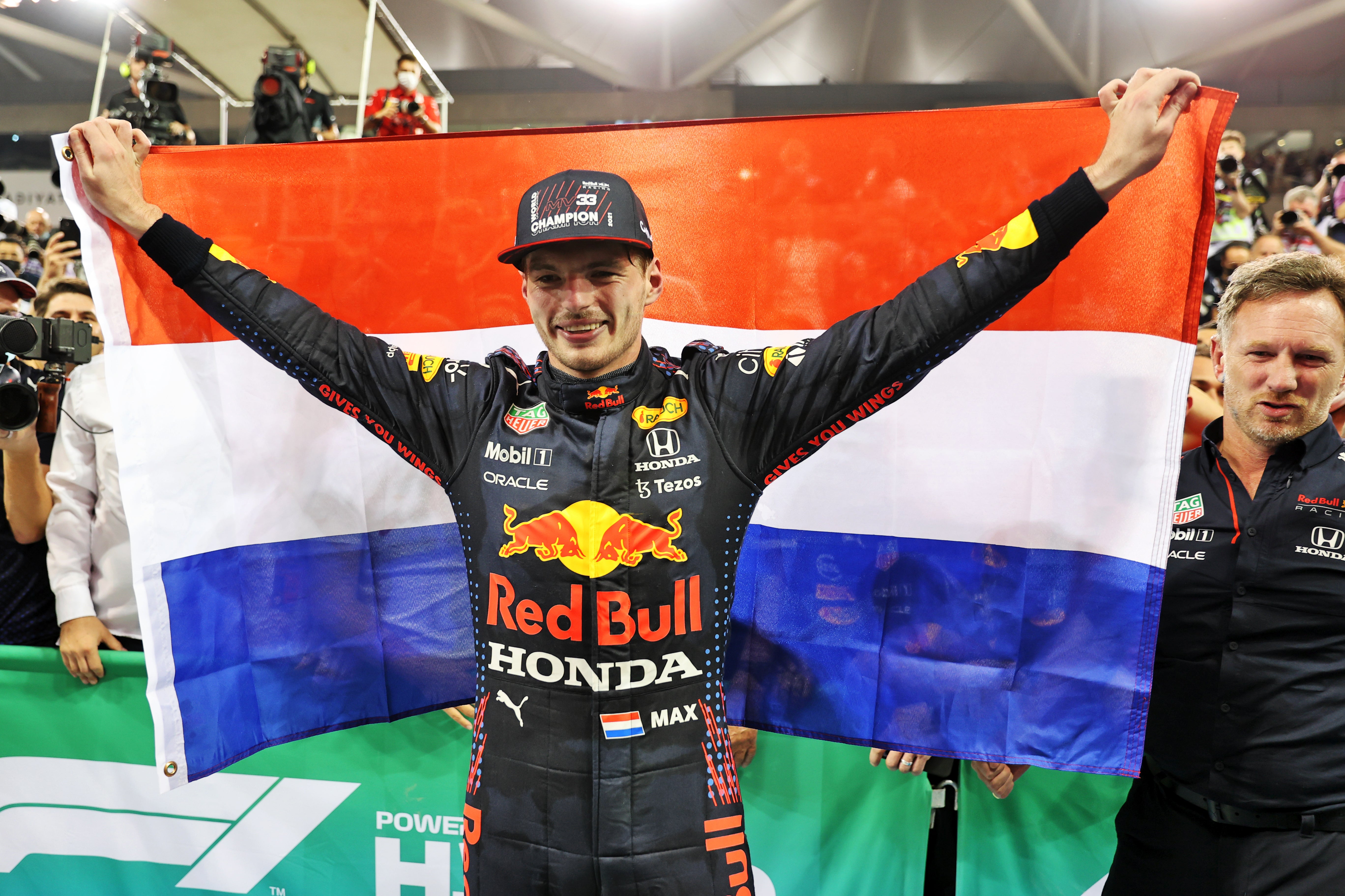 Max Verstappen claimed victory on the final lap of the season to clinch the title (PA Wire)