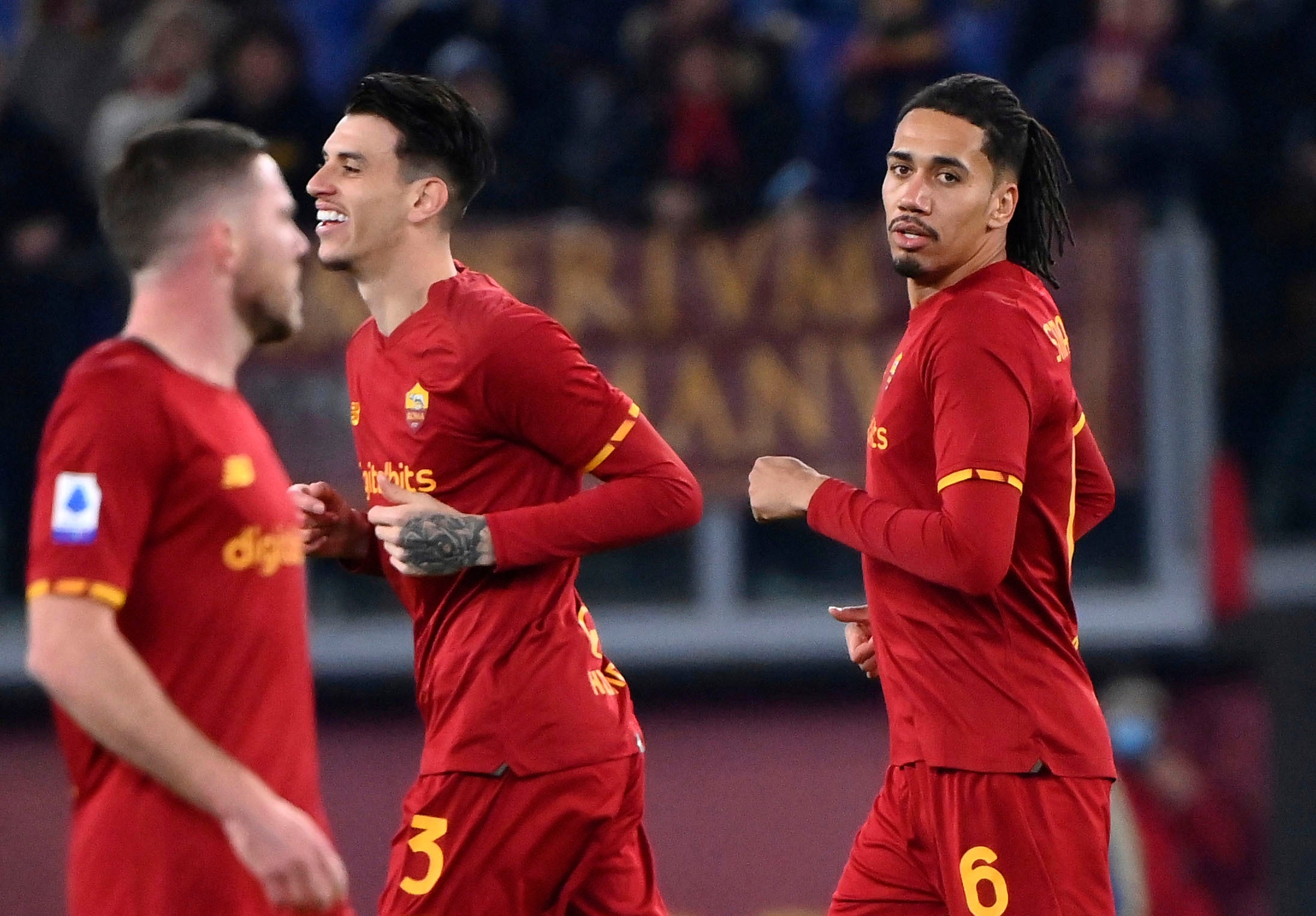 Chris Smalling, right, helped Roma to victory (Alfredo Falcone/AP)