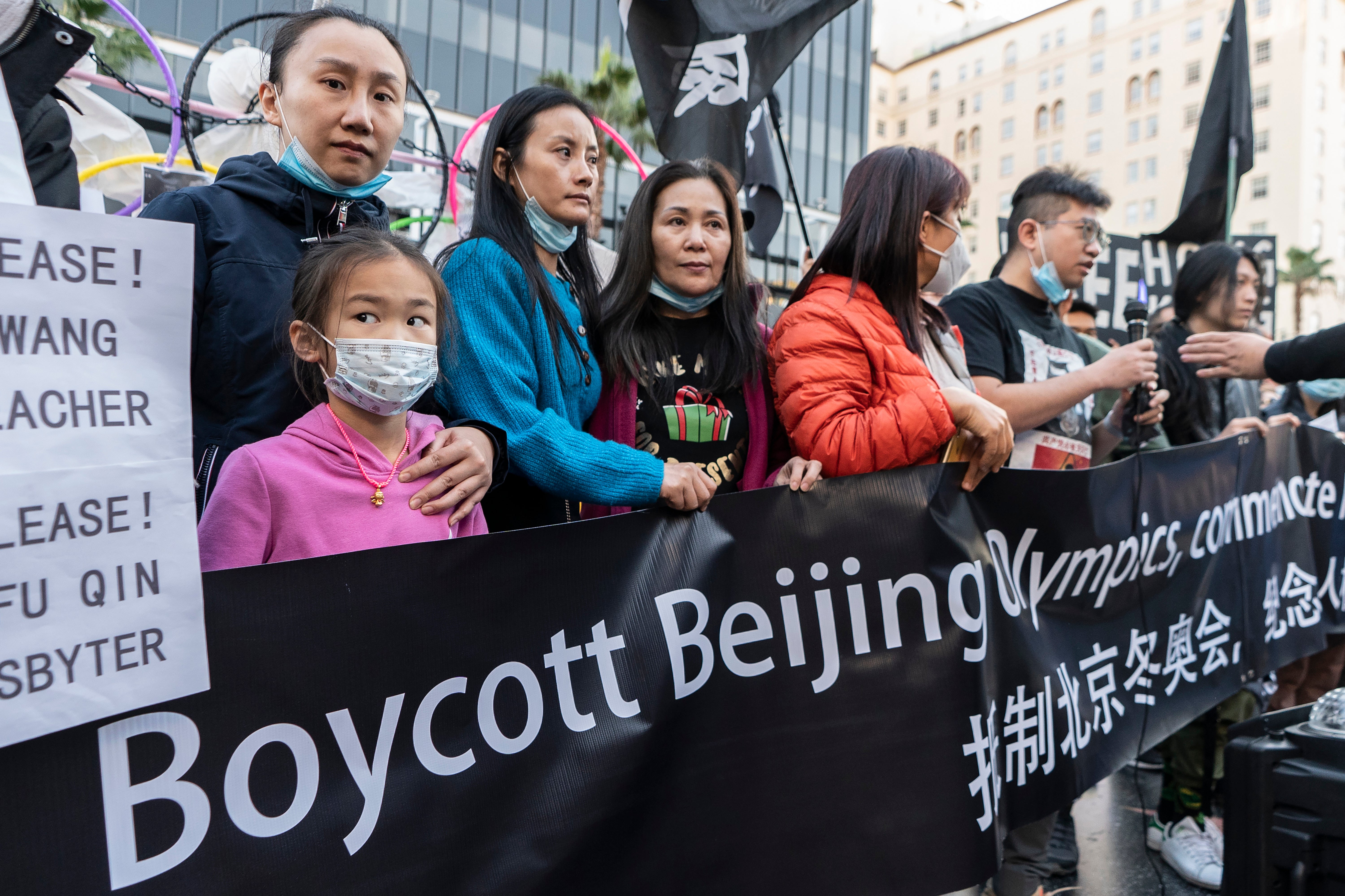 Protesters rally against the Beijing 2022 Winter Olympic Games on International Human Rights Day outside the TCL Theatre in Los Angeles in 2021