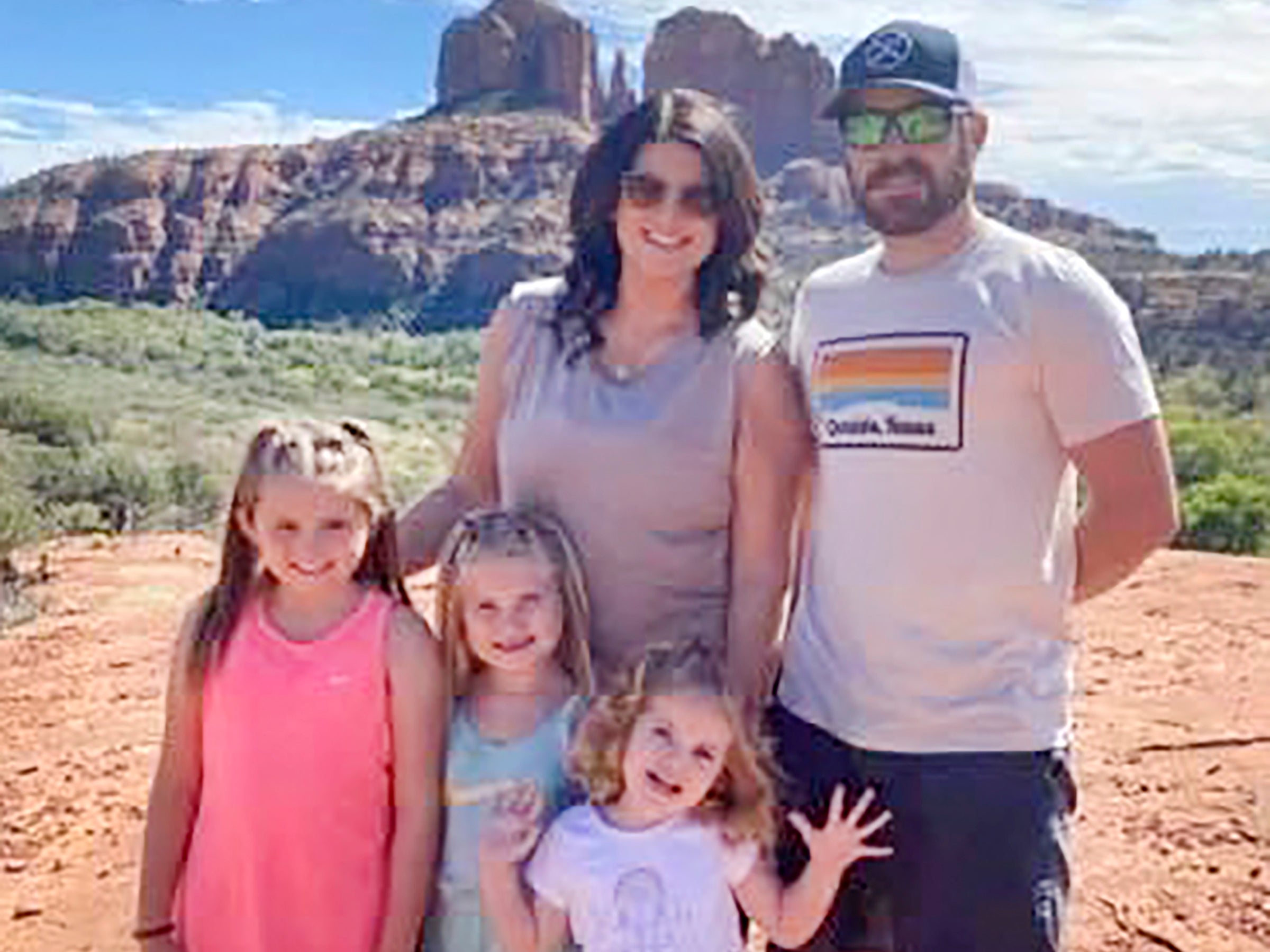 In this undated photo provided by Sandra Hooker, the Rackley family poses for a picture while on a trip to Sedona, Arizona