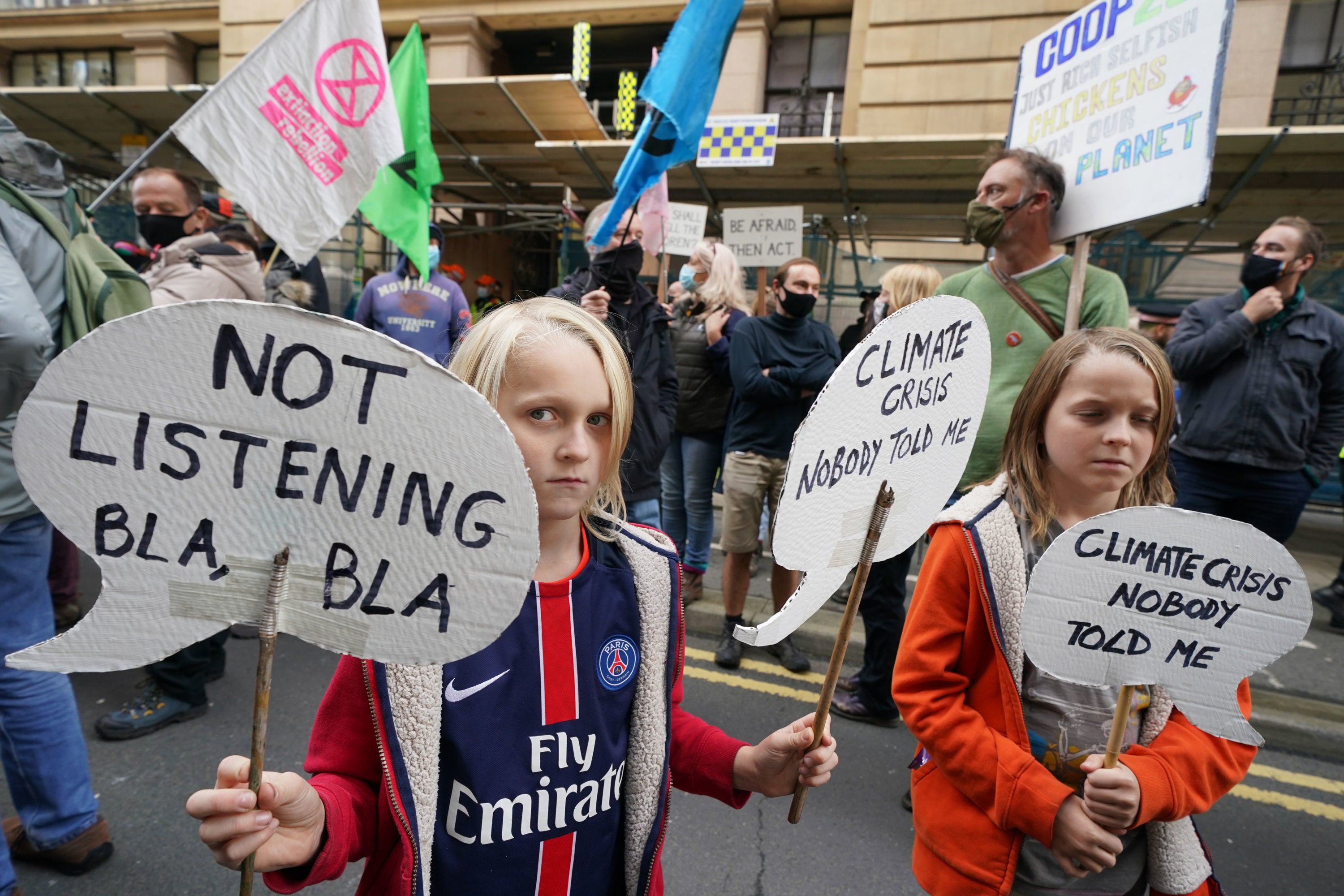 Climate activists take part in a ‘Trillion Dollar Bash’ outside the Glasgow offices of JP Morgan during the Cop26 climate summit in November