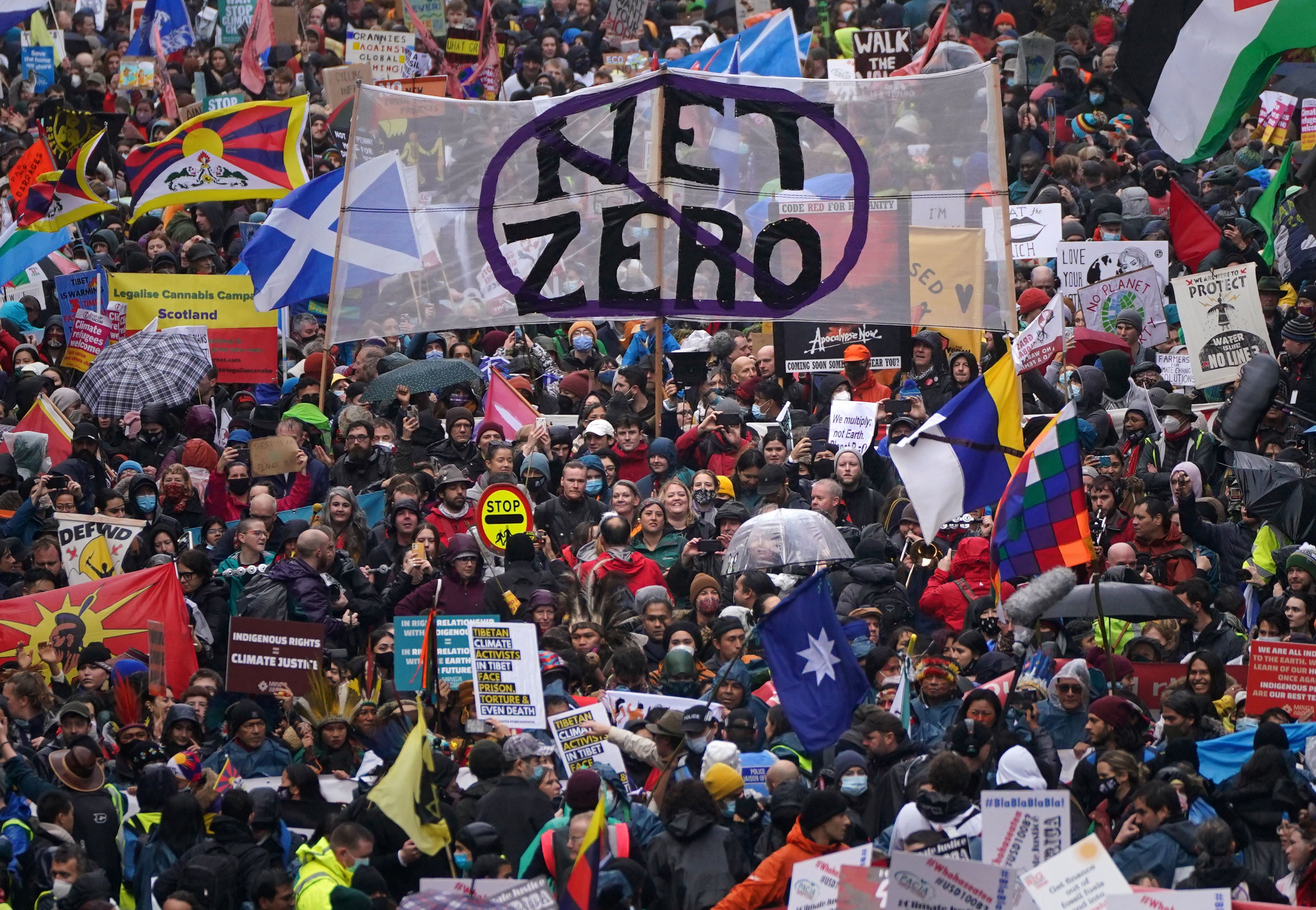 Protesters take part in a rally organised by the Cop26 Coalition in Glasgow