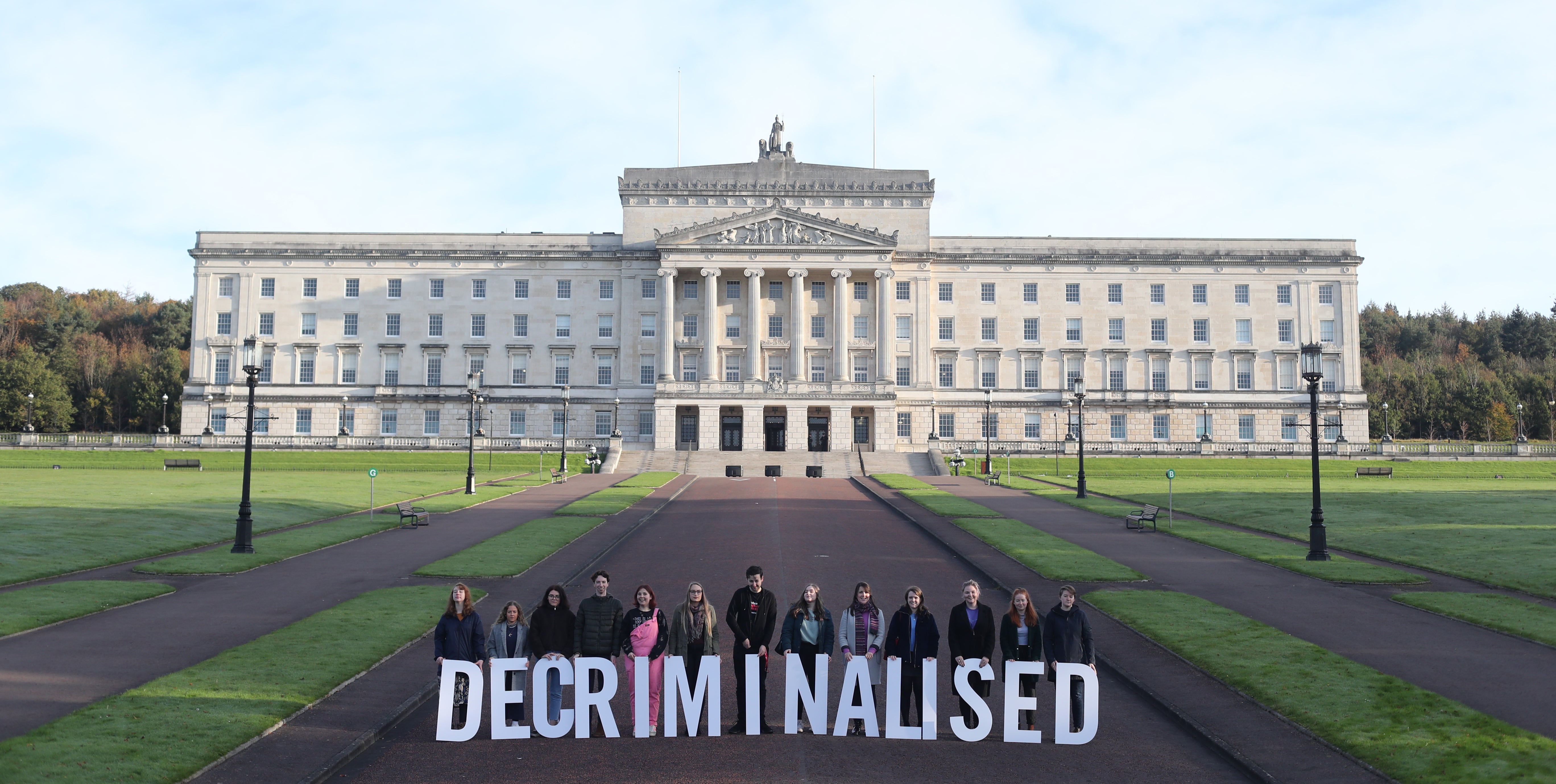 Pro Choice activists take part in a photocall in the grounds of Stormont Parliament (PA)