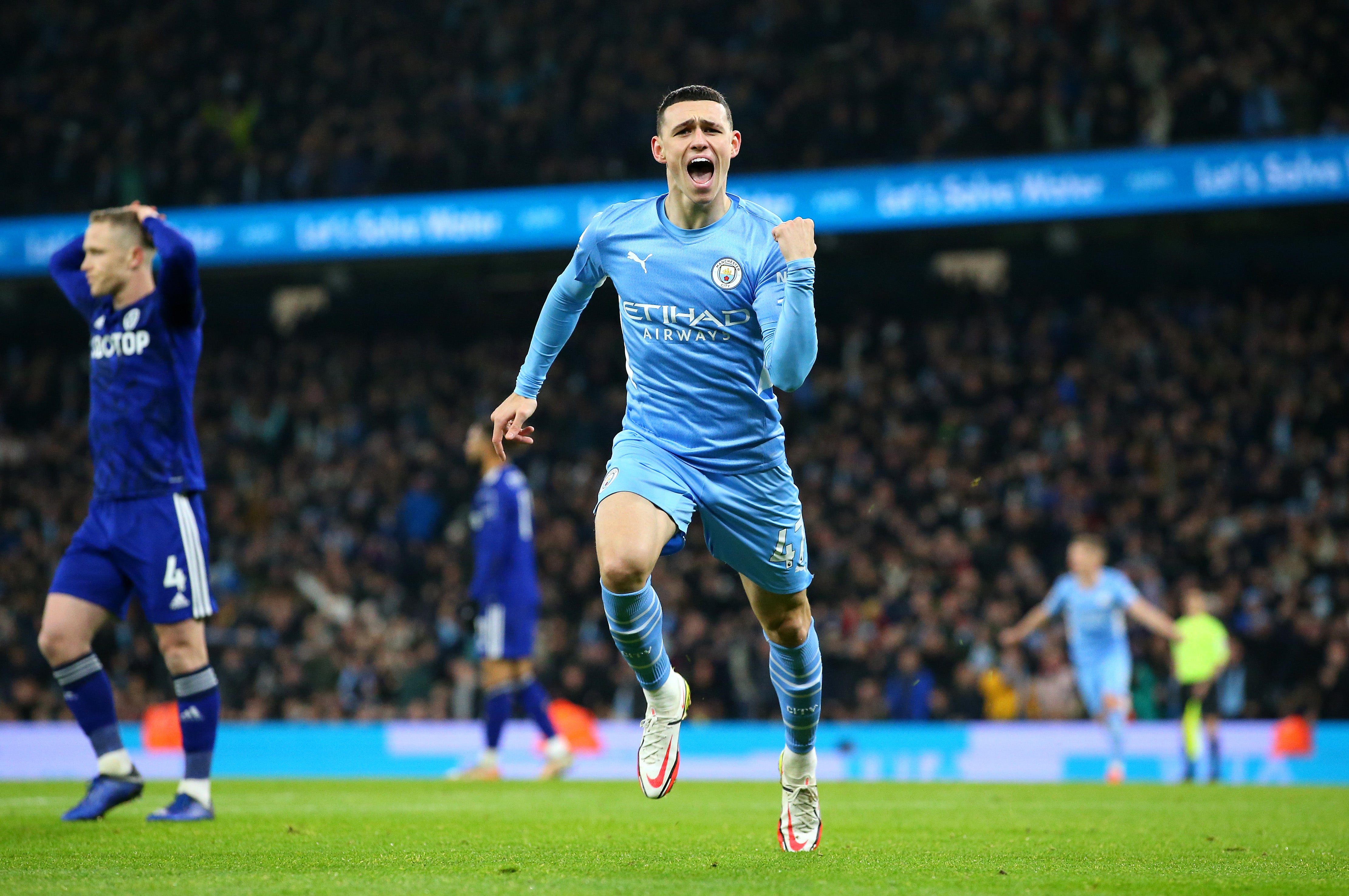 Phil Foden celebrates after opening the scoring