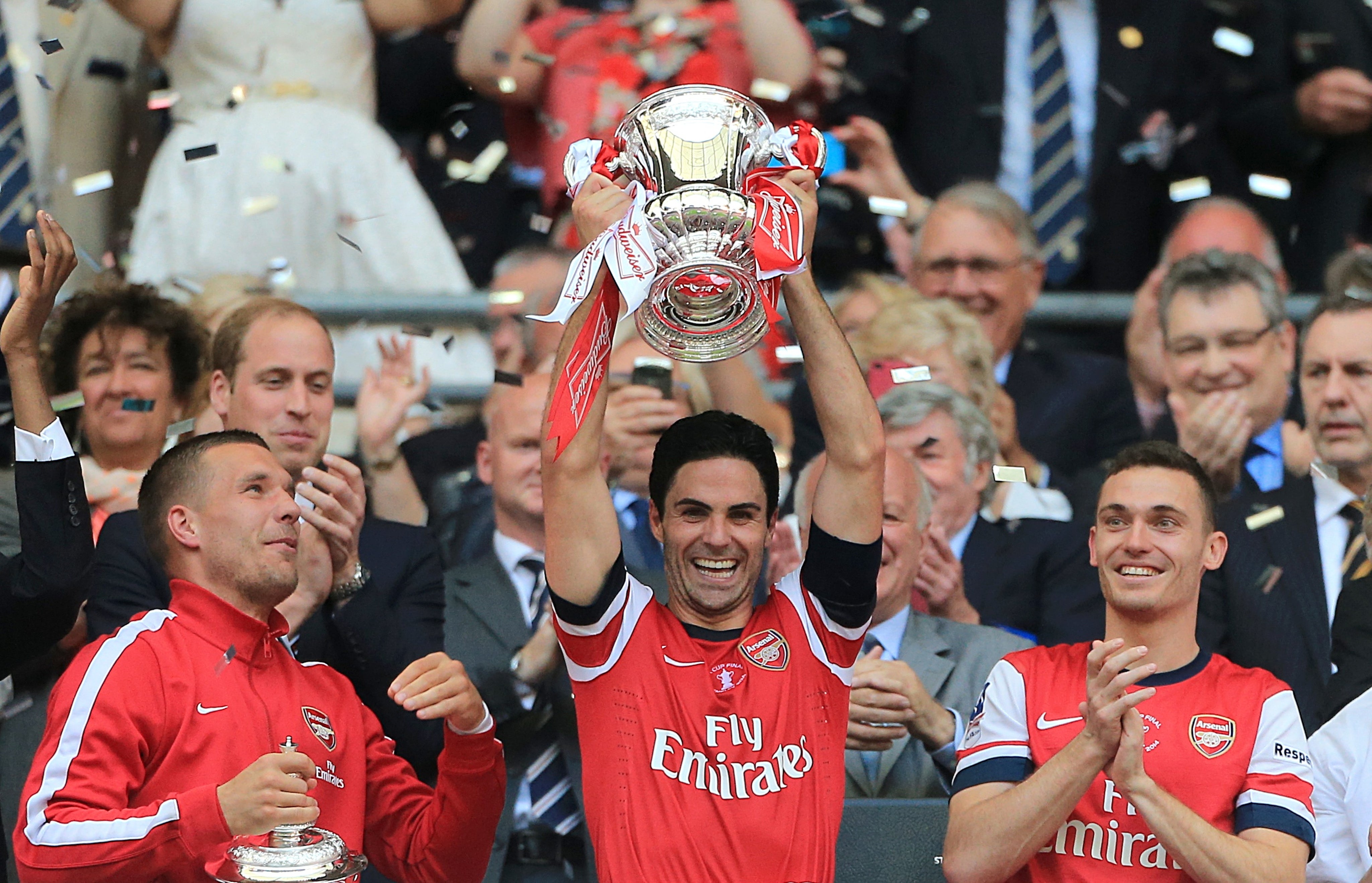 Mikel Arteta, centre, lifted the FA Cup as Arsenal captain (Nick Potts/PA)