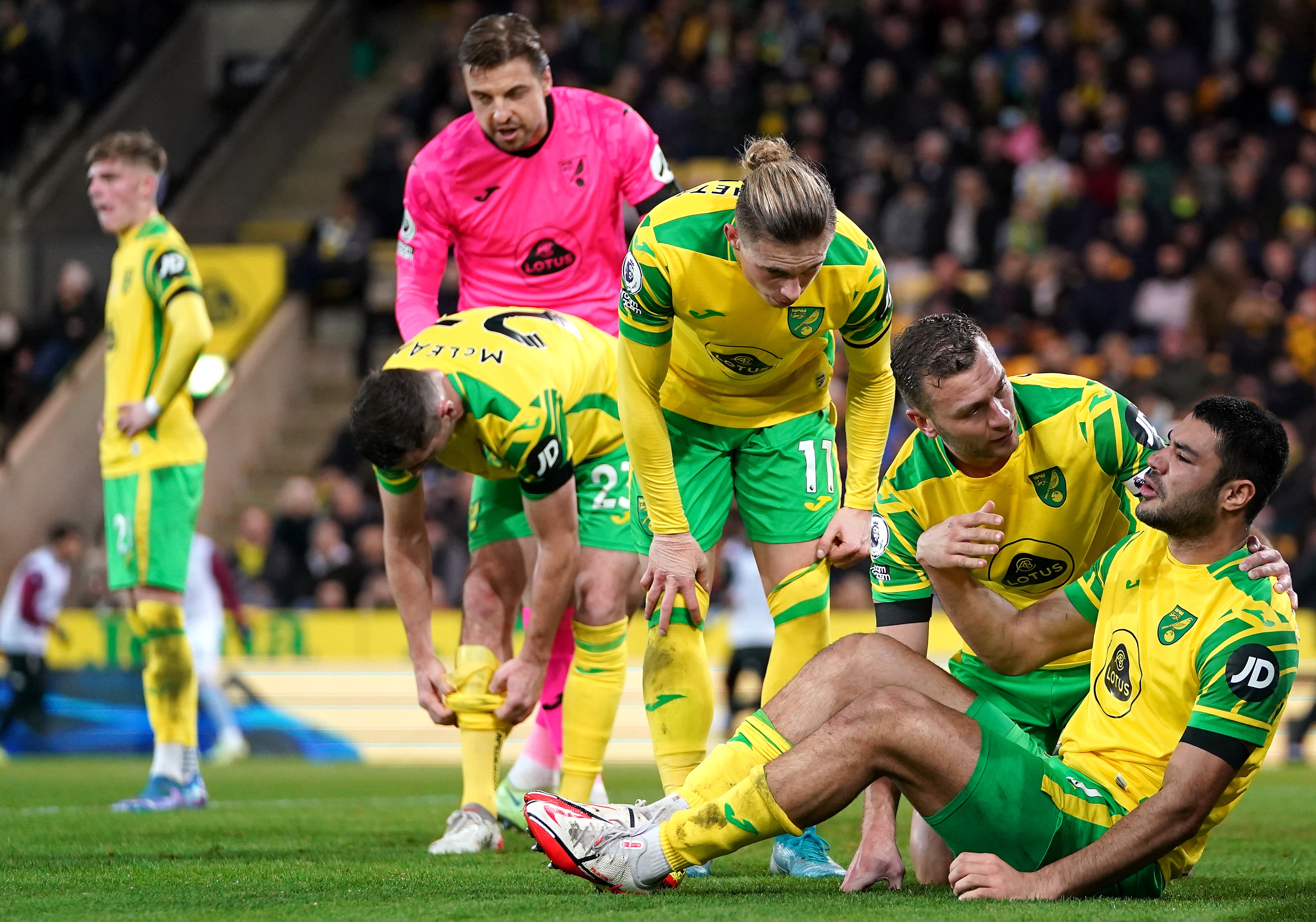 Ozan Kabak, right, goes down injured against Aston Villa (Joe Giddens/PA)