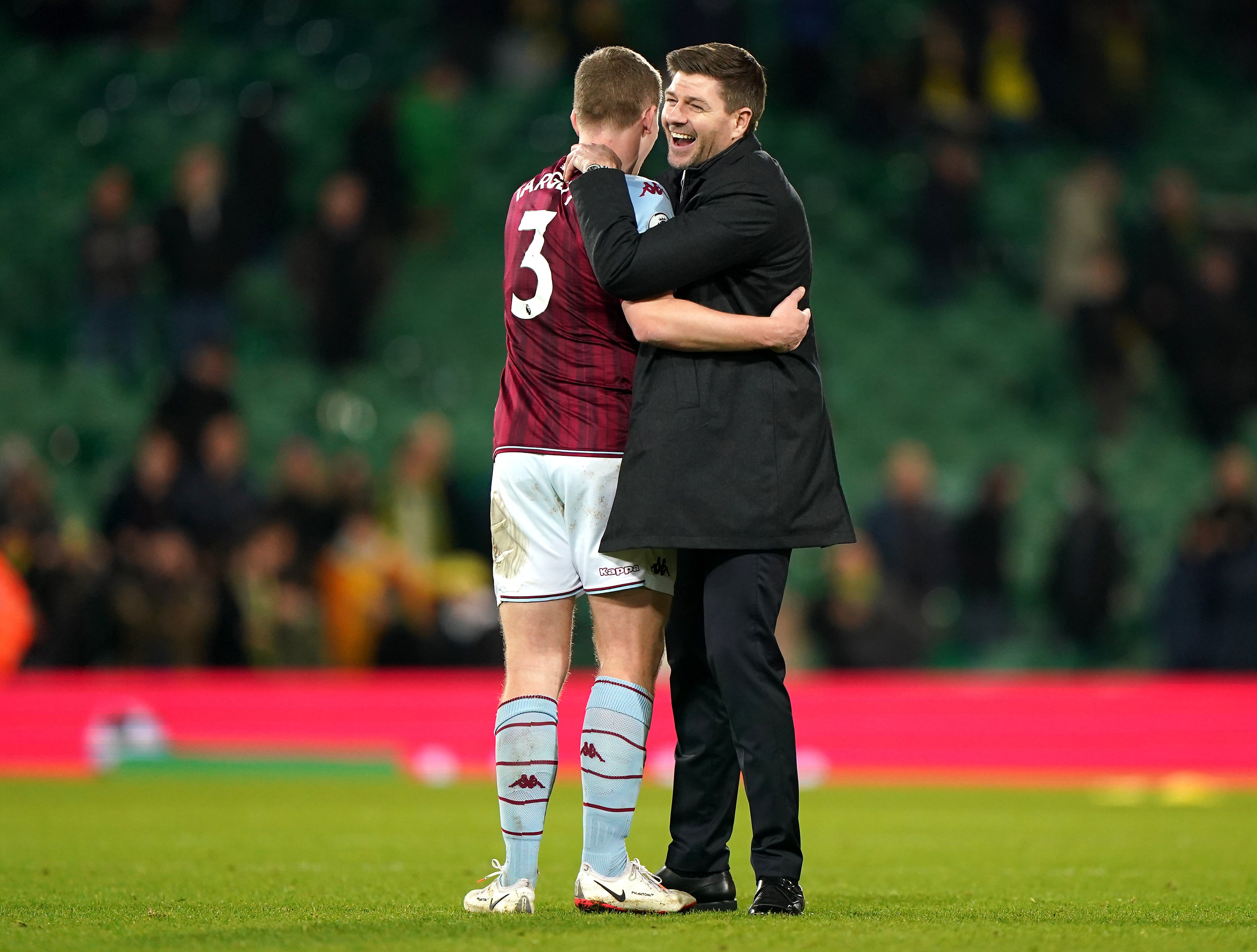 Steven Gerrard, right, celebrates Villa’s win (Joe Giddens/PA)