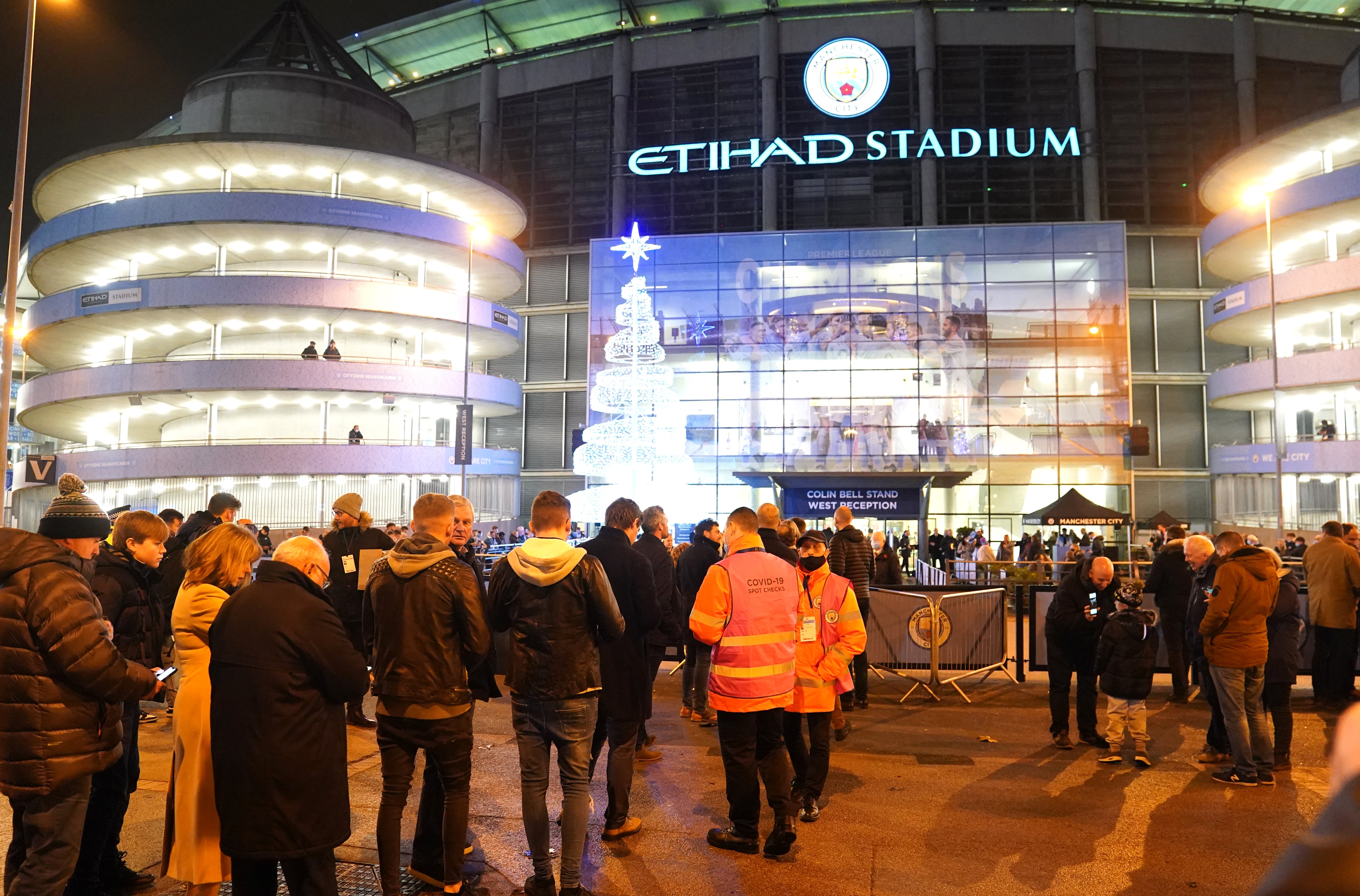 Fans in England will need to show proof of full Covid-19 vaccination or a recent negative test to enter sporting venues holding more than 10,000 people from Wednesday (Martin Rickett/PA)