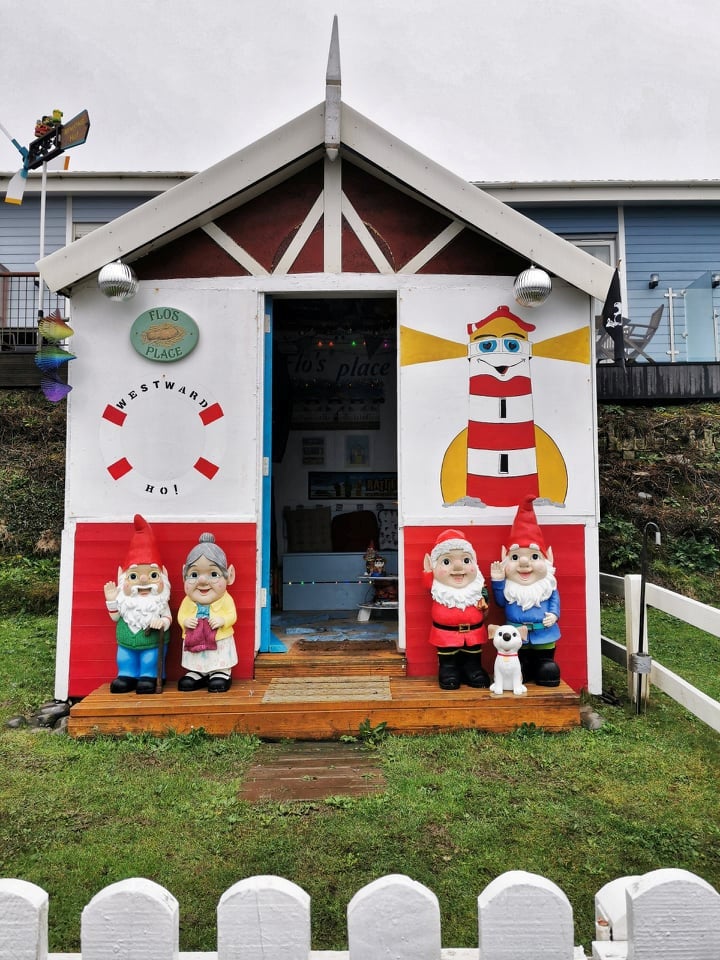 The gnomes standing in front of the hut have been named after his dad and brother, who have also sadly passed away