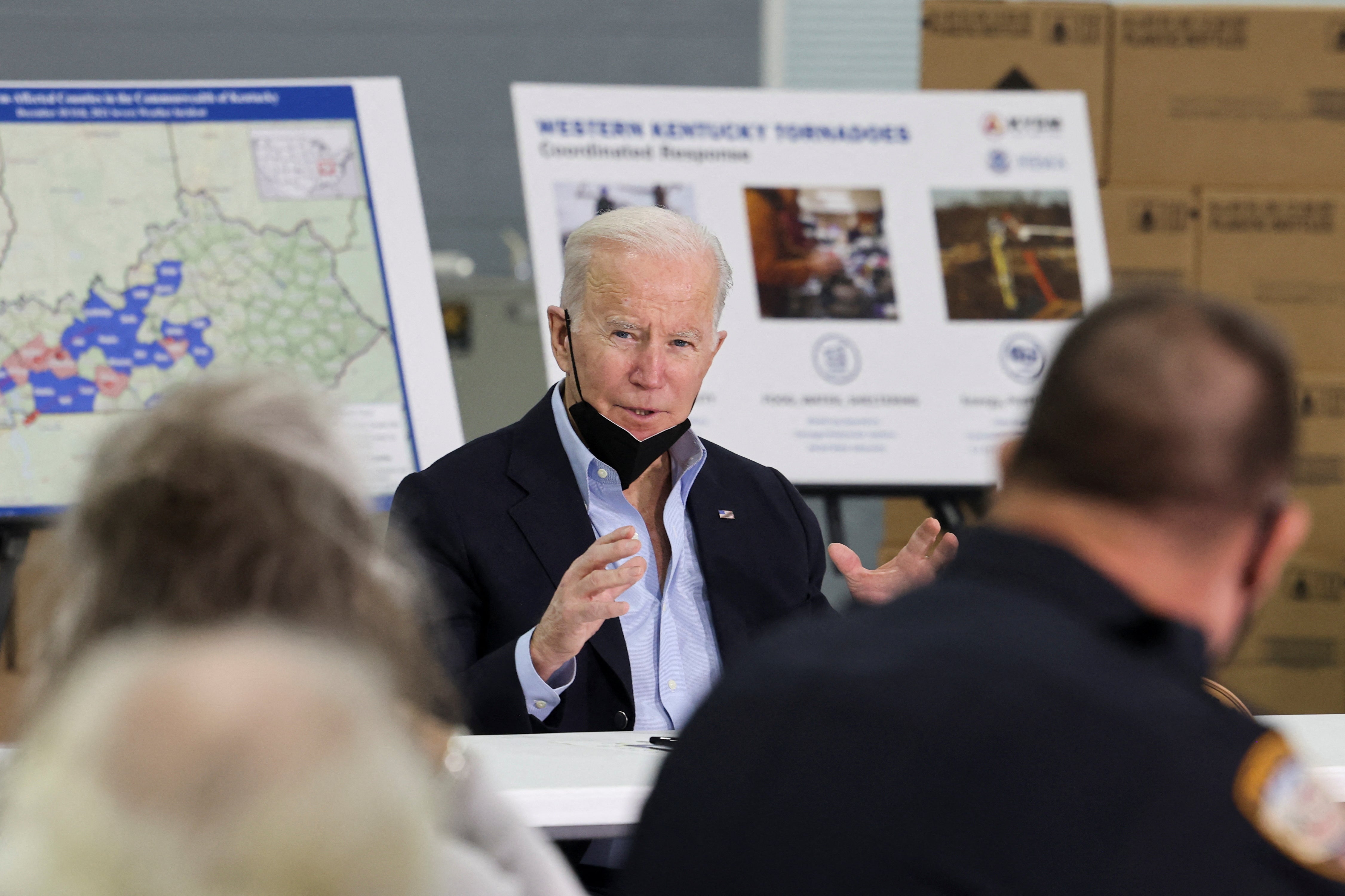 Biden speaks to local leaders at a briefing in Mayfield, Kentucky, on 15 December 2021