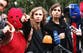 Russia sentences Pussy Riot members in absentia to jail for anti-war messages