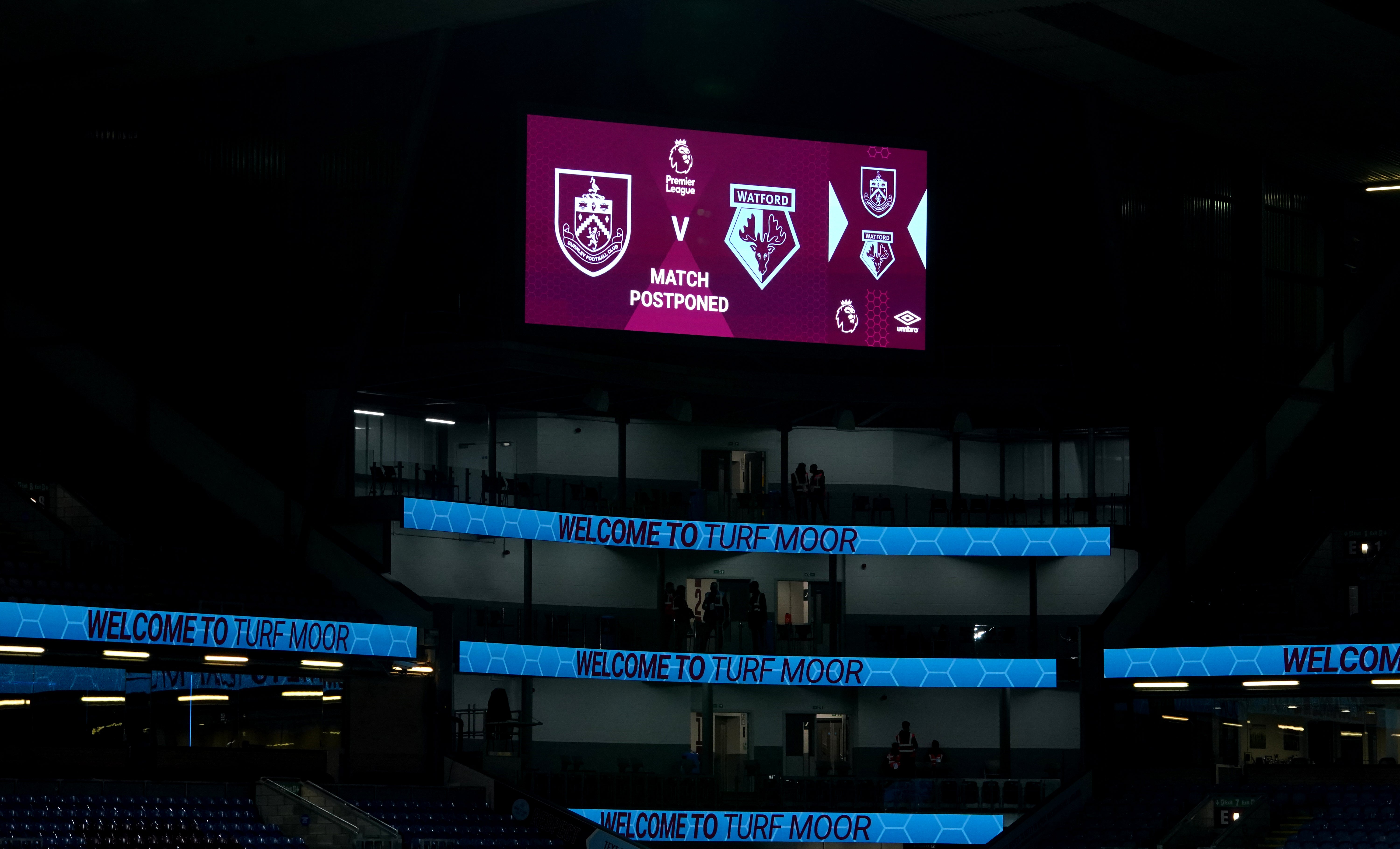 A general view of the giant screen confirming that the Premier League match at Turf Moor between Burnley and Watford has been postponed (Martin Rickett/PA)