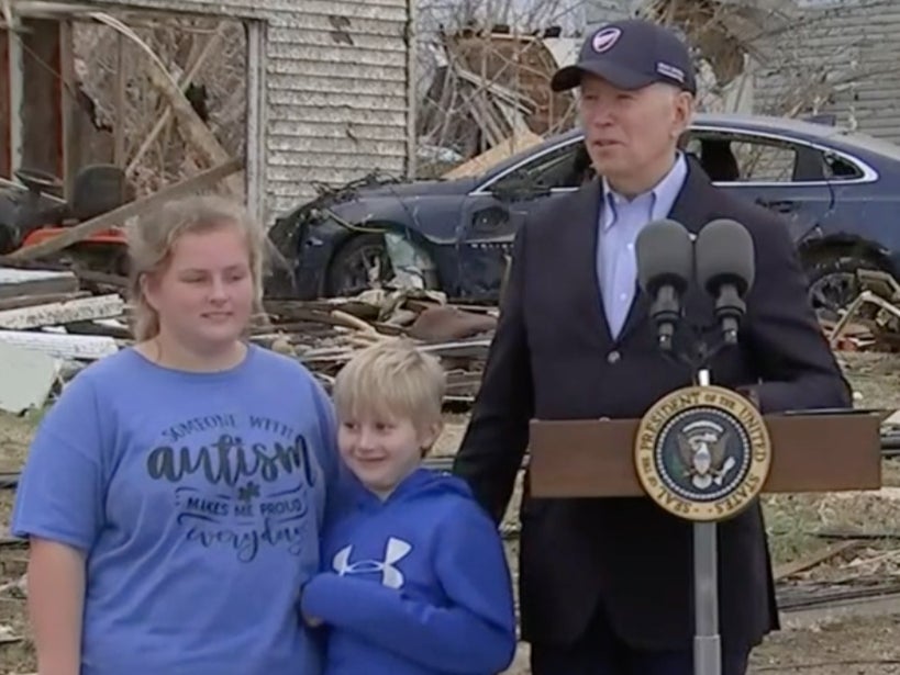 Joe Biden introduces two tornado survivors at a press conference in Dawson Springs, Kentucky, on December 15 2021