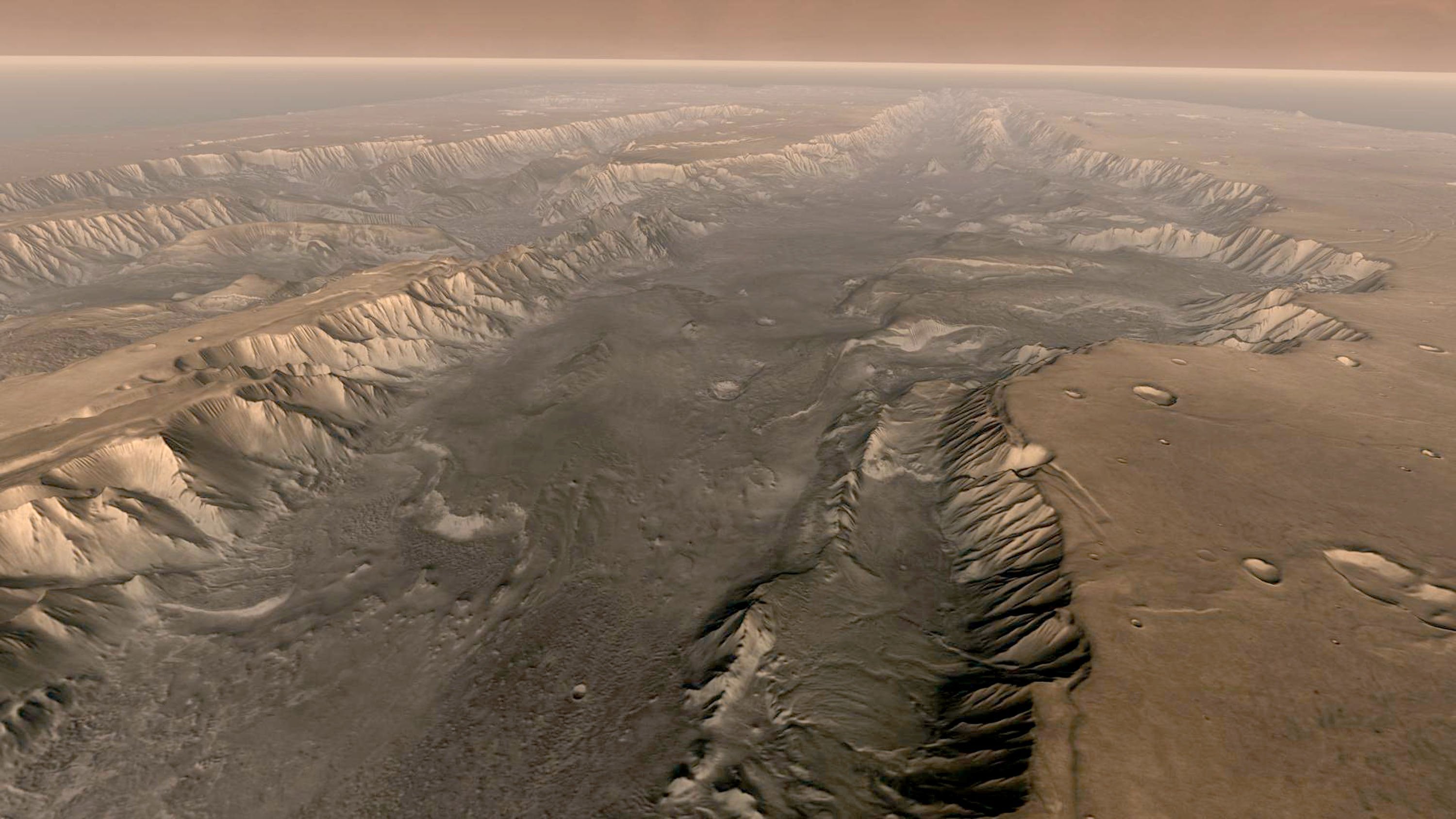 Mars’ own Grand Canyon, Valles Marineris, is shown on the surface of the planet in this composite image made aboard NASA’s Mars Odyssey spacecraft