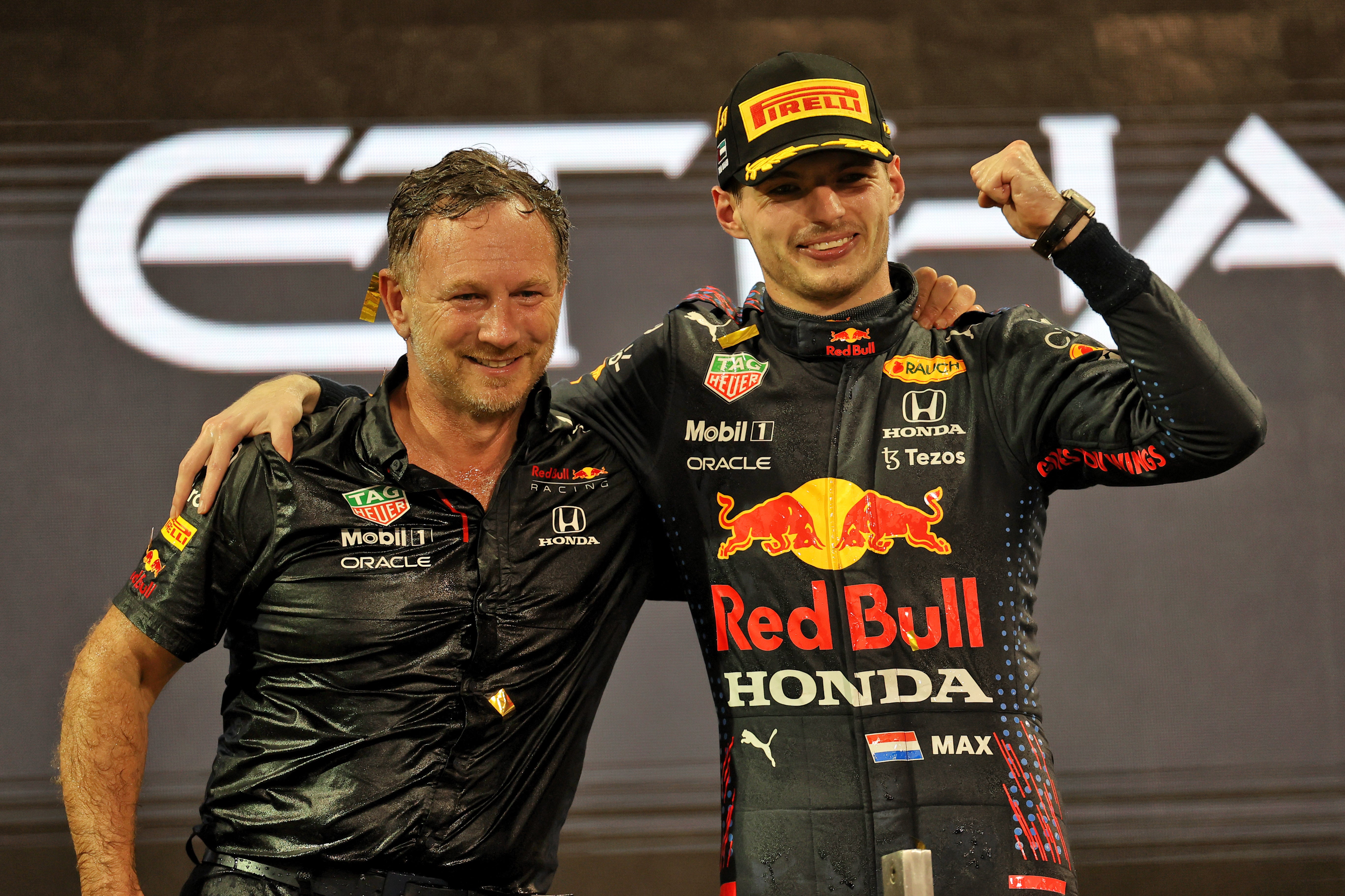 Red Bull’s Max Verstappen celebrates alongside team principal Christian Horner after winning his first Formula One world championship title (PA Wire)