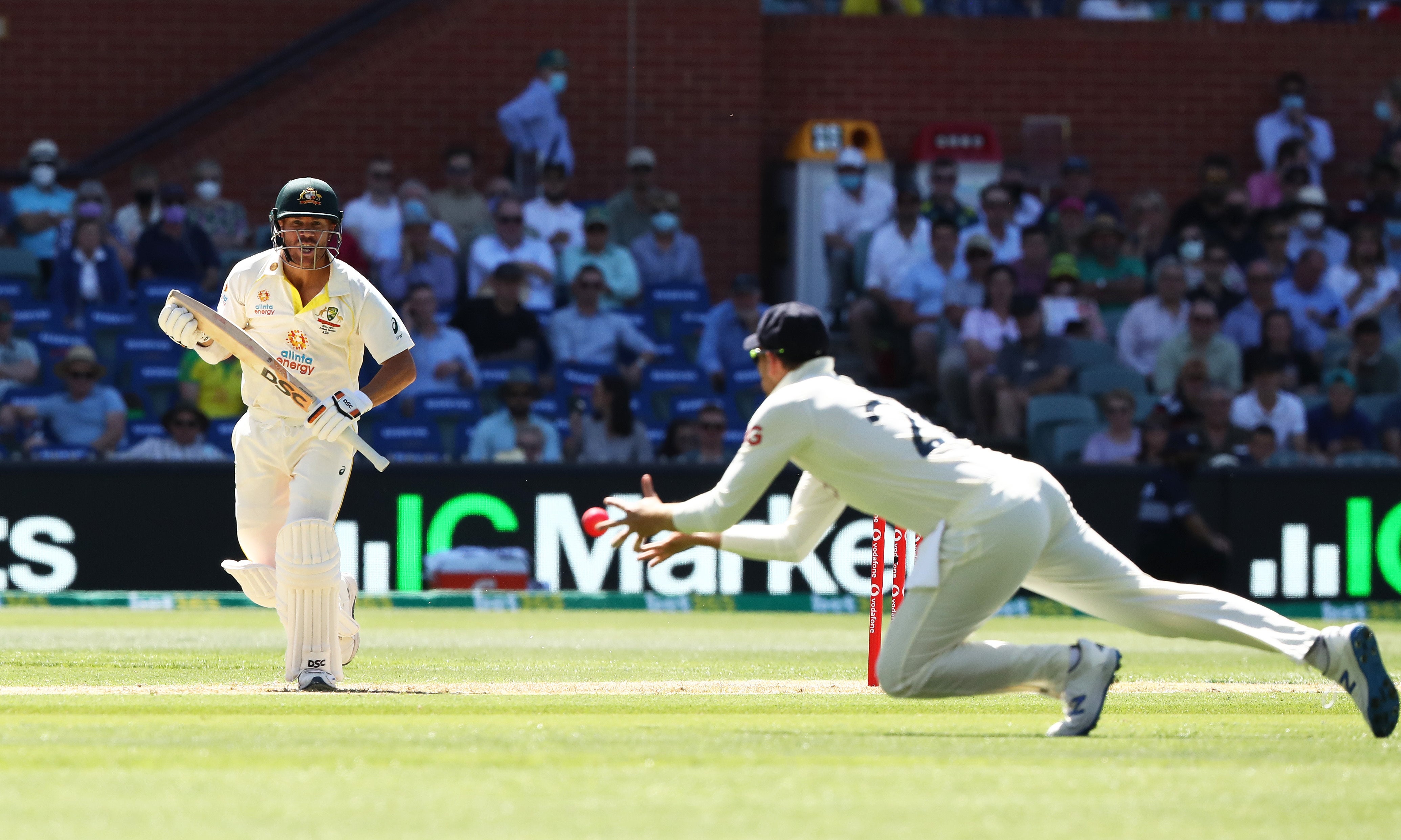 David Warner has a shot fielded by England’s Dawid Malan (Jason O’Brien/PA)