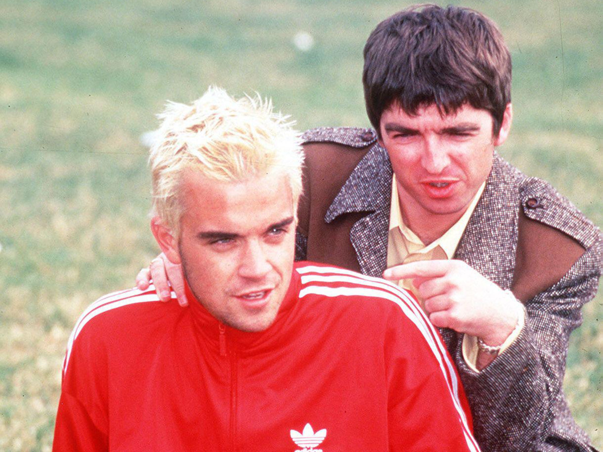 ‘Now’ mainstays: Robbie Williams and Noel Gallagher at Glastonbury in 1995